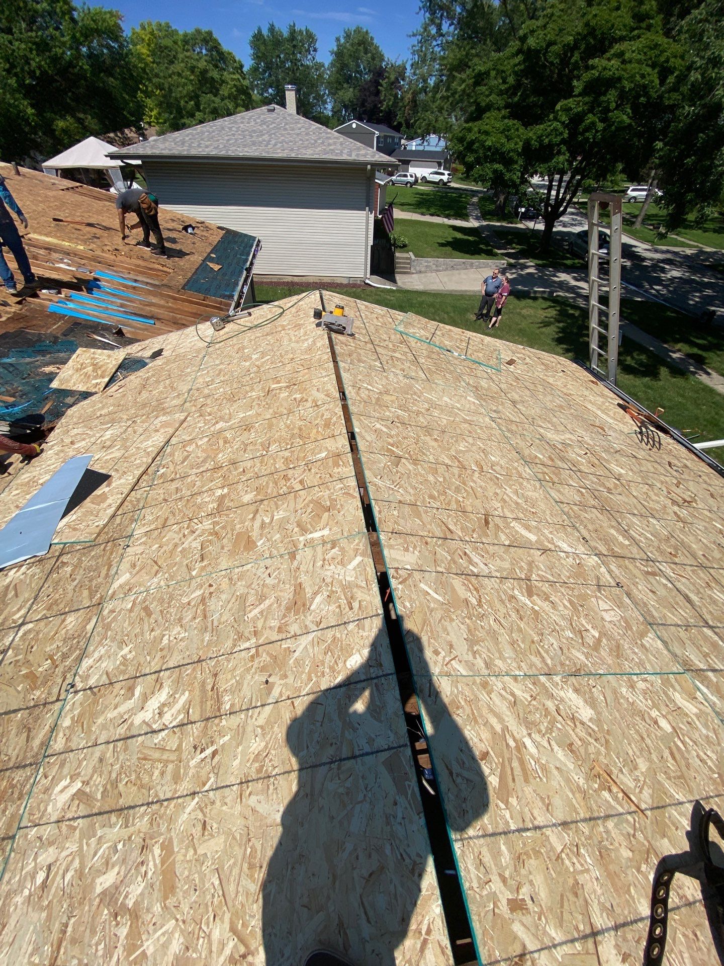 Asphalt Roof Replacement by Custom Installations