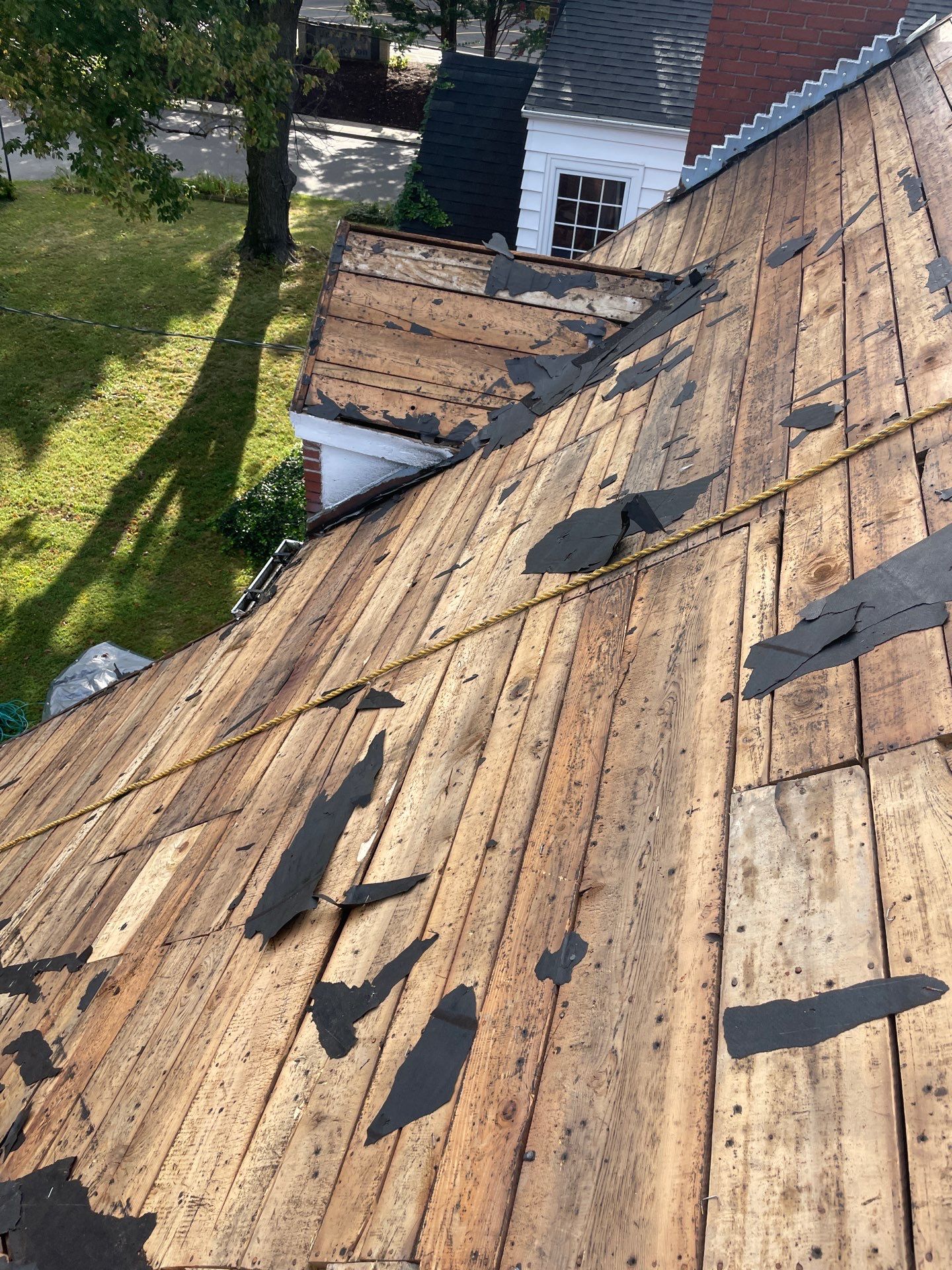 Residential Roofing Installation using GAF Timberline HDZ Weathered Wood by Rainstoppers Roofing