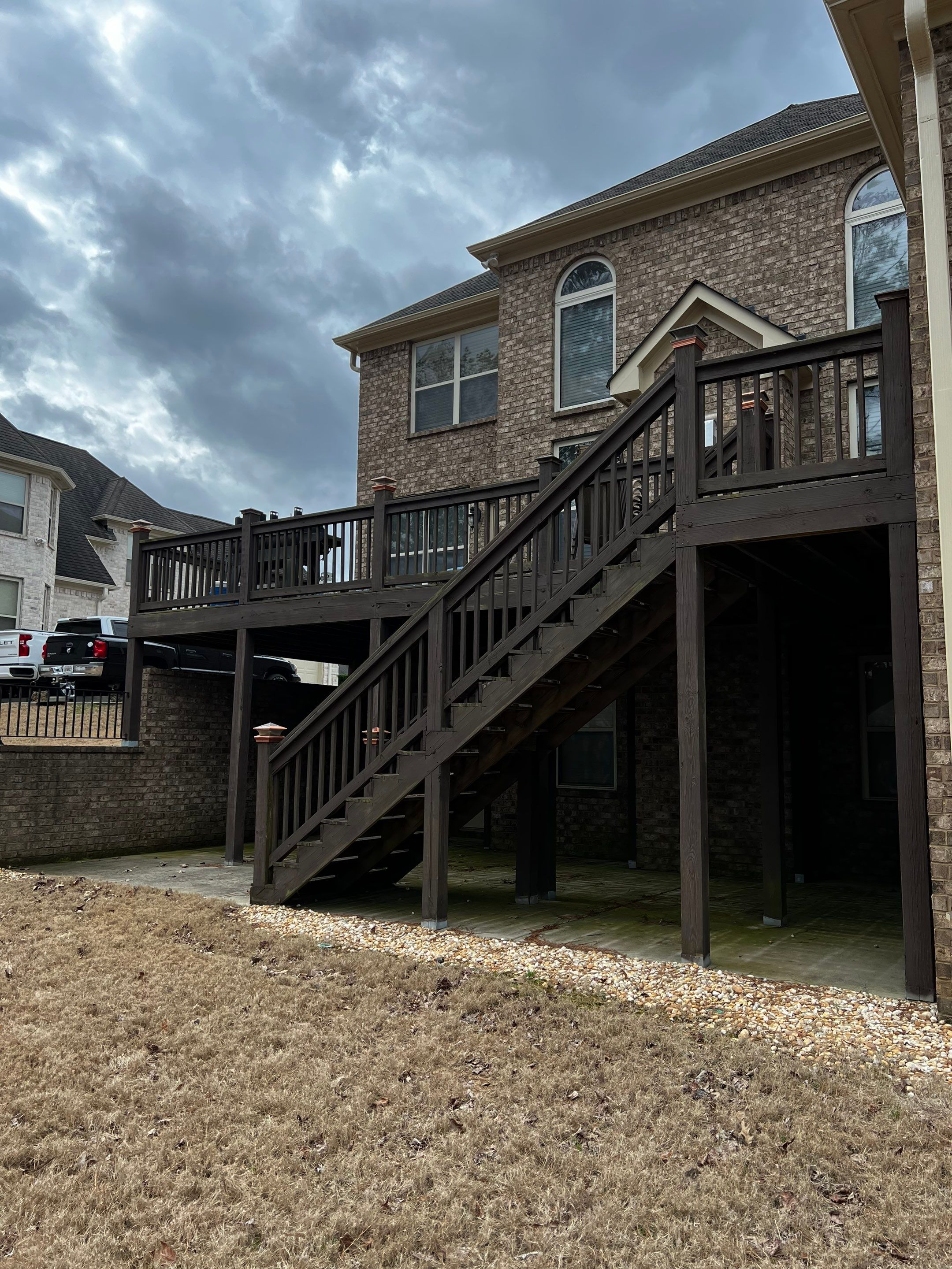 Elevated Pressure-Treated Wood Deck and Staircase in Hampton by Swift Home Renovations
