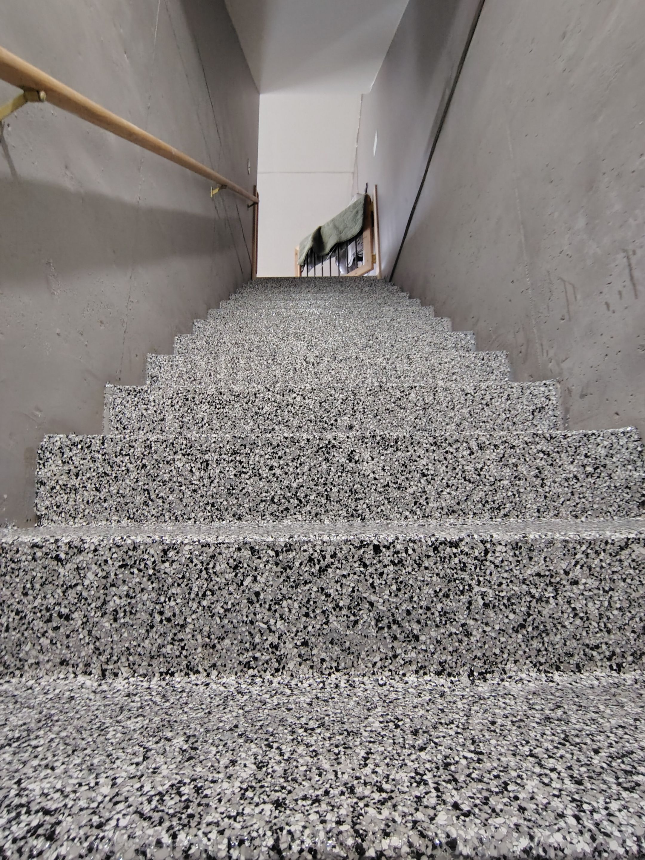 Garage Floor Concrete Coating and Crack Repair in Sioux Falls by Select Painting, Coatings & Garage Cabinets