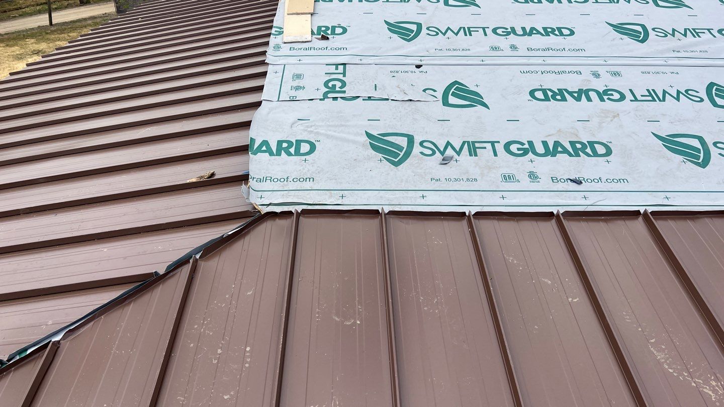 Metal roofing installation using Standing seam metal roofing system by Straight Edge Roofing Inc