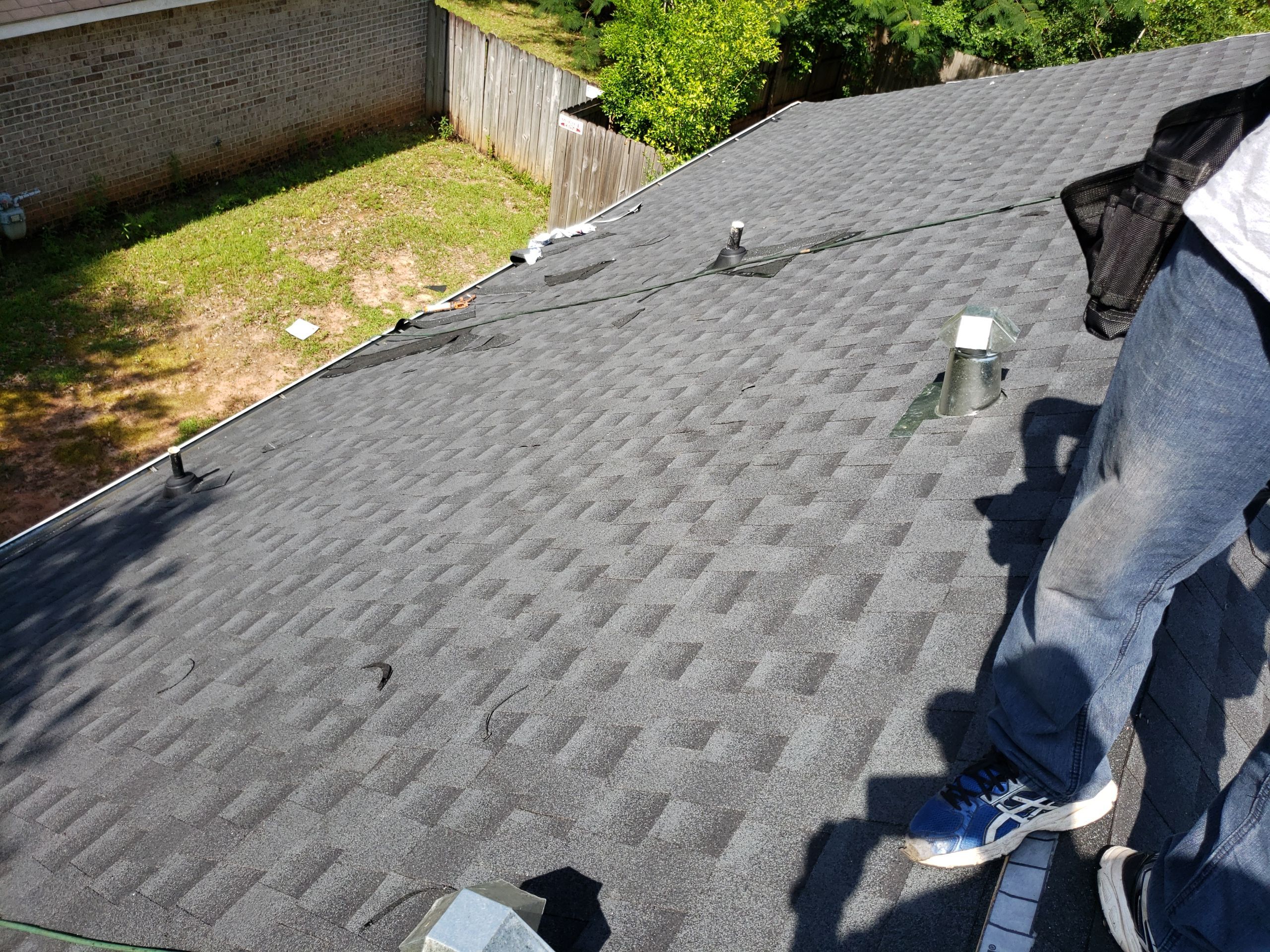 Residential Roofing Installation using Roof Replacement by American Roofing & Construction LLC