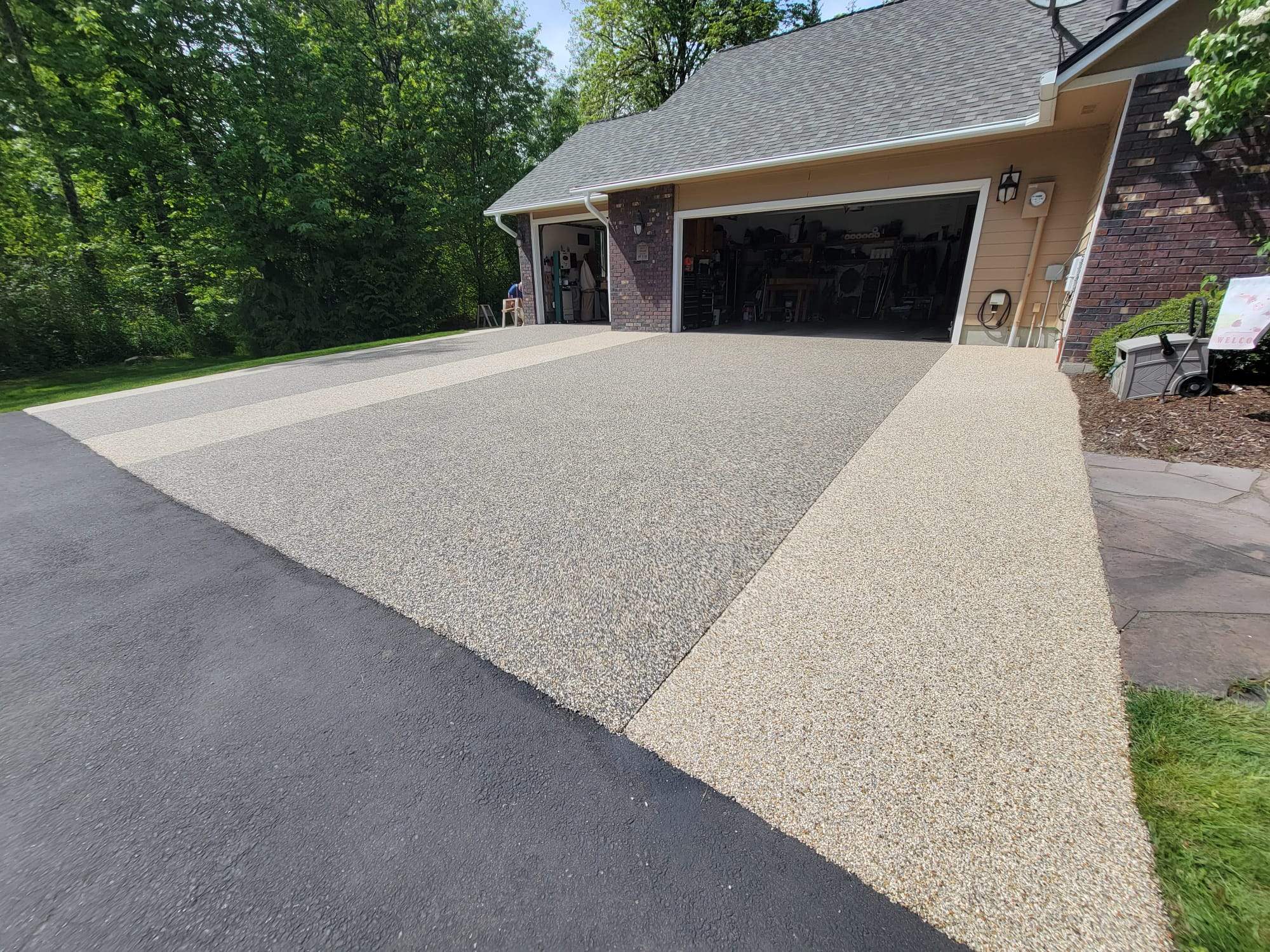 Luxury Driveway with Big Sur and Sistine Chapel Borders by Concrete Coating Experts Inc.