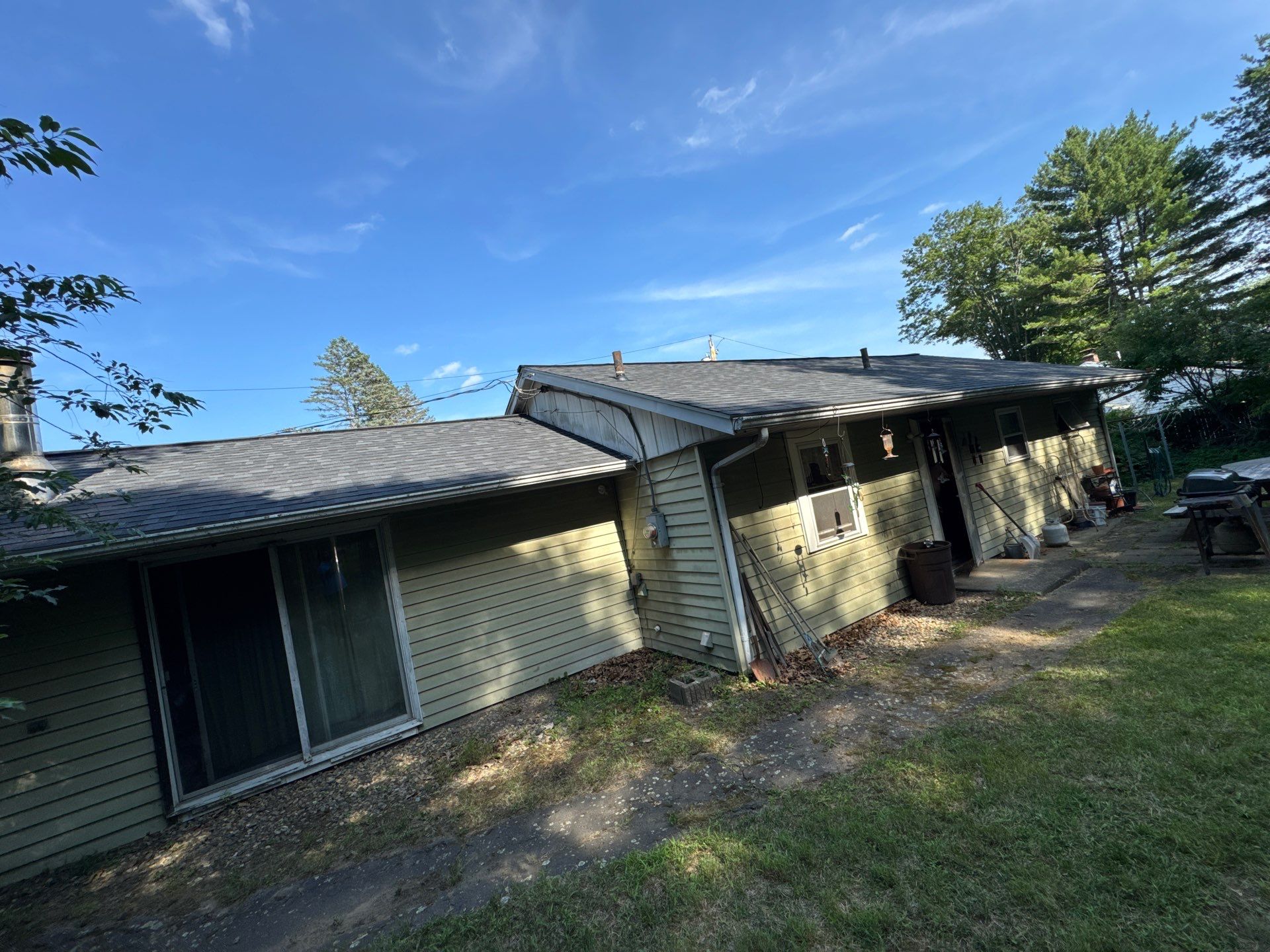 Onyx Black Roof Transformation in Maynard, MA by Mighty Dog Roofing of Greater Middlesex County