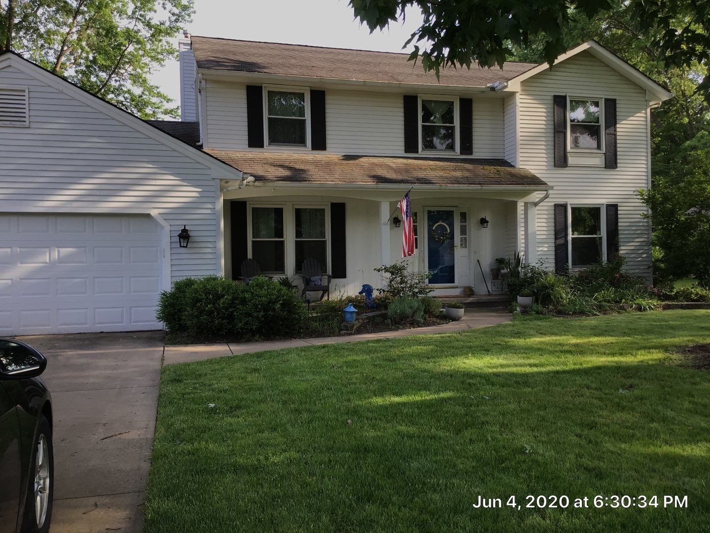 James Hardie Siding  using James Hardie Board and Batten, White by Absolute Roofing and Construction