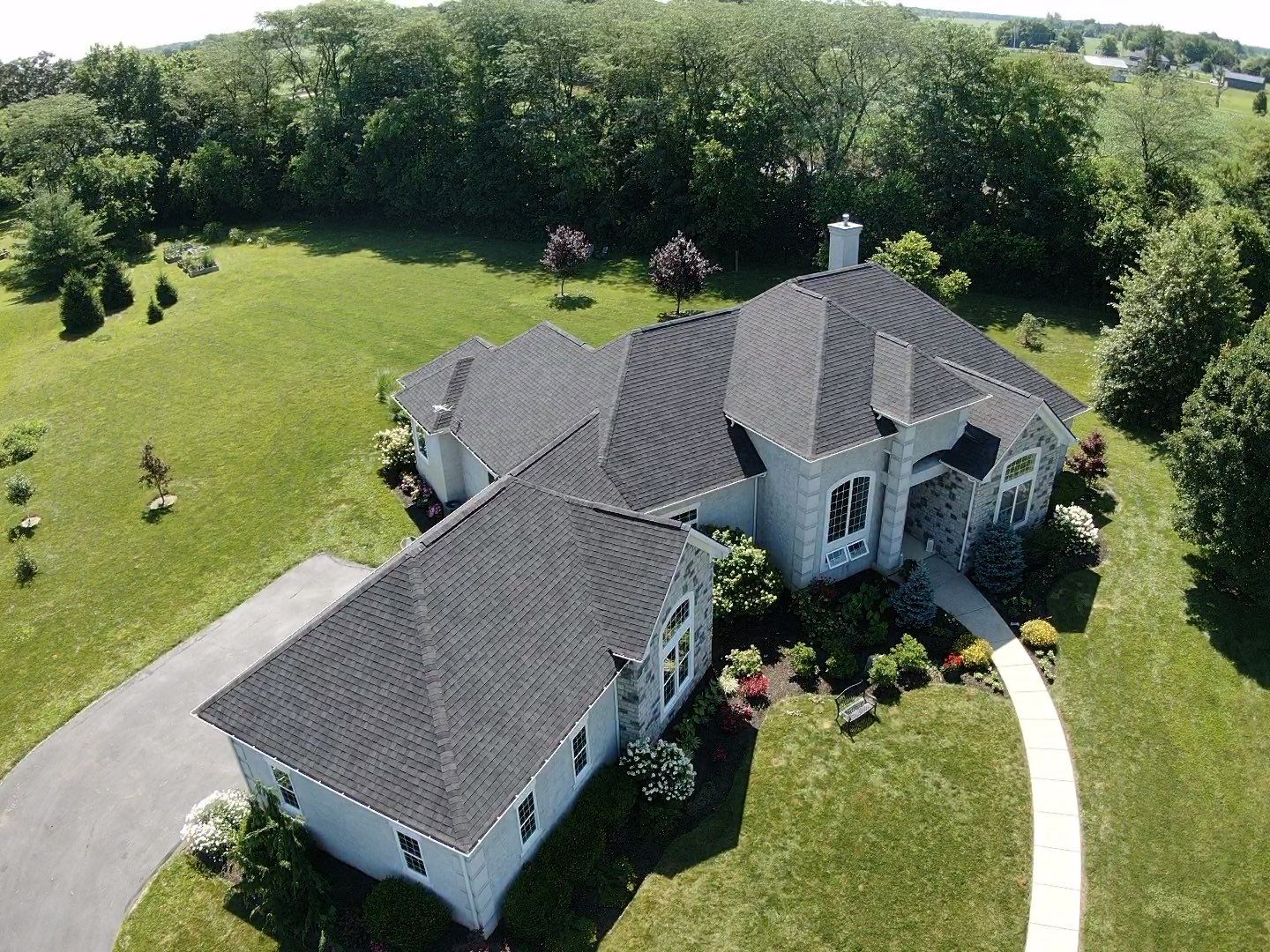 Residential Roofing Installation using Atlas Pinnacle Black Shingles by 614 Exteriors