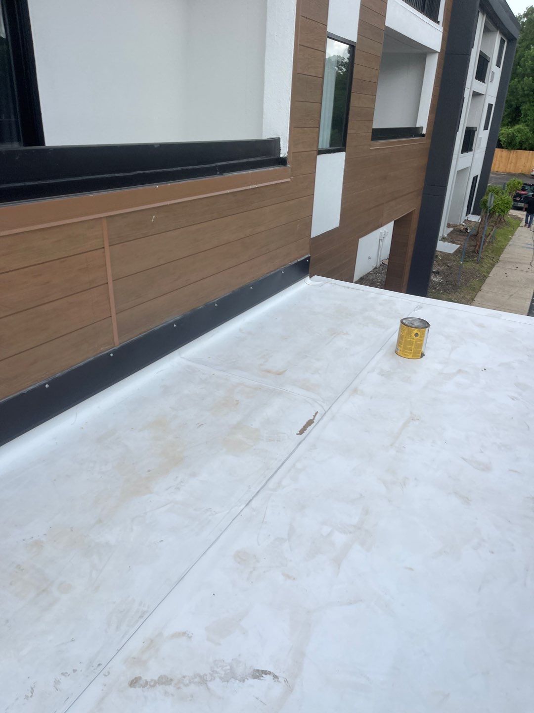 Commercial Roofing Installation using Roof Replacement by American Roofing & Construction LLC