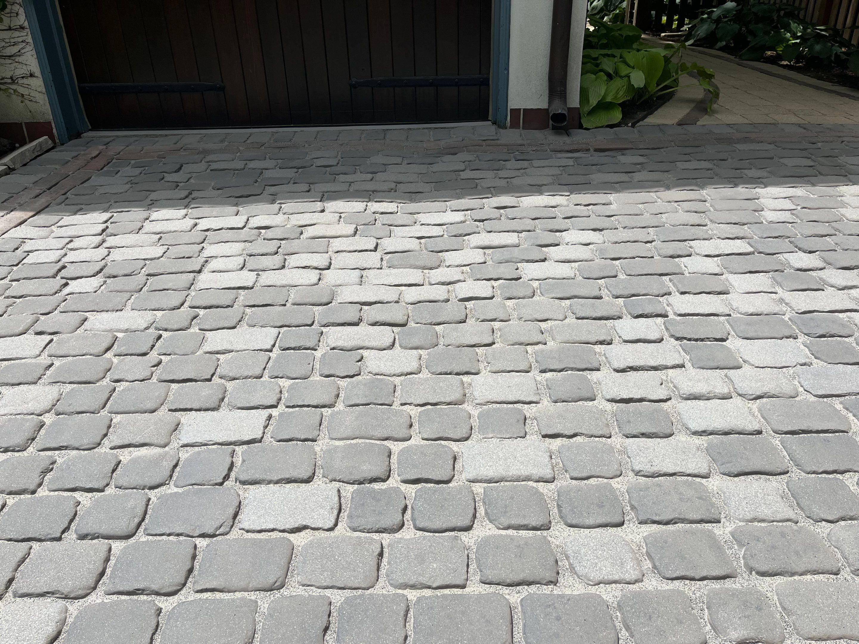 Glencoe, IL brick paver clean sand seal, repair, and reseal by Northern Power Washing LLC.