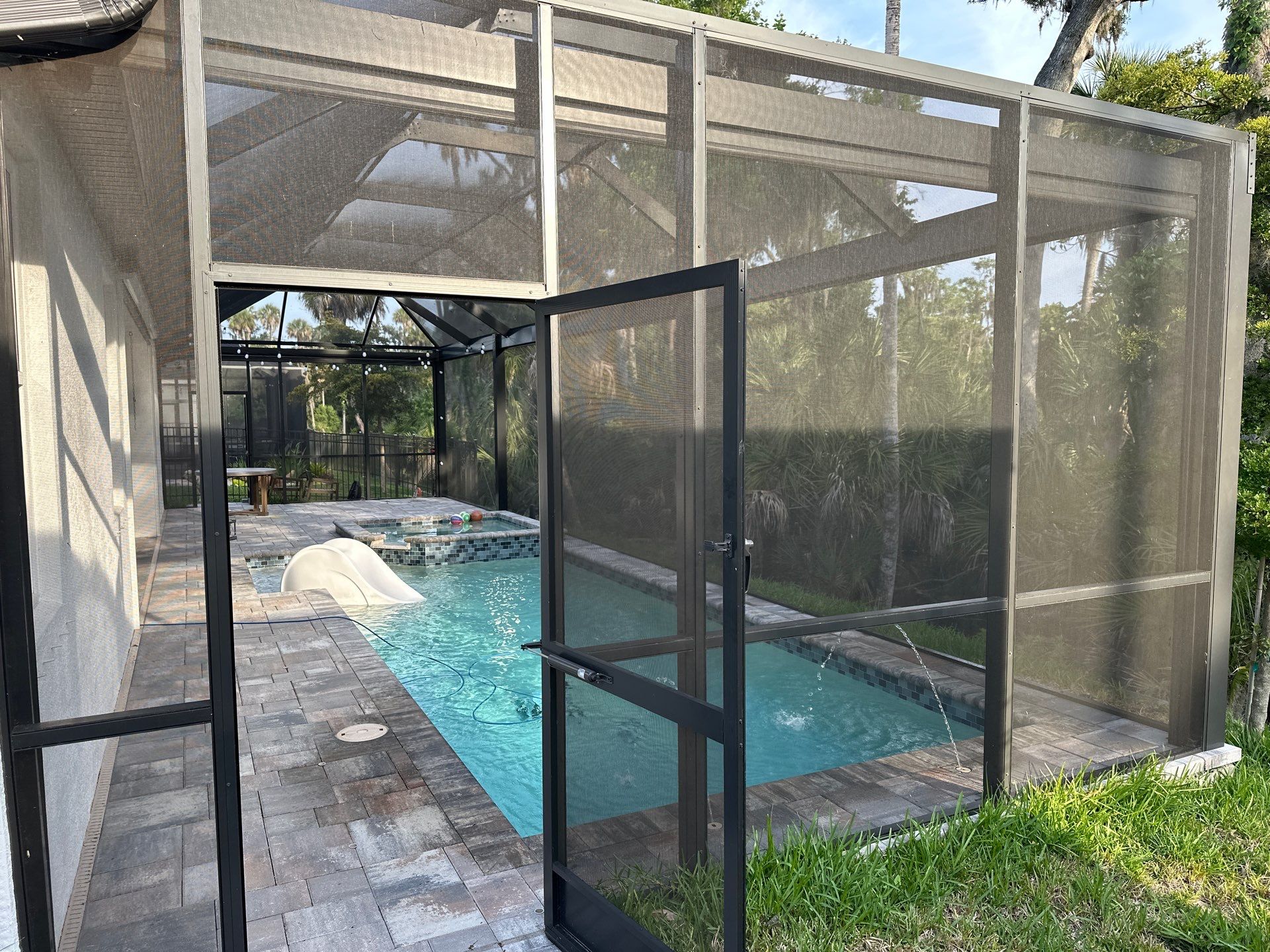 Screen Enclosure & Paver Pool Deck Cleaning in Trevesta Community, Palmetto, FL | Sunshine AquaWash by Sunshine AquaWash