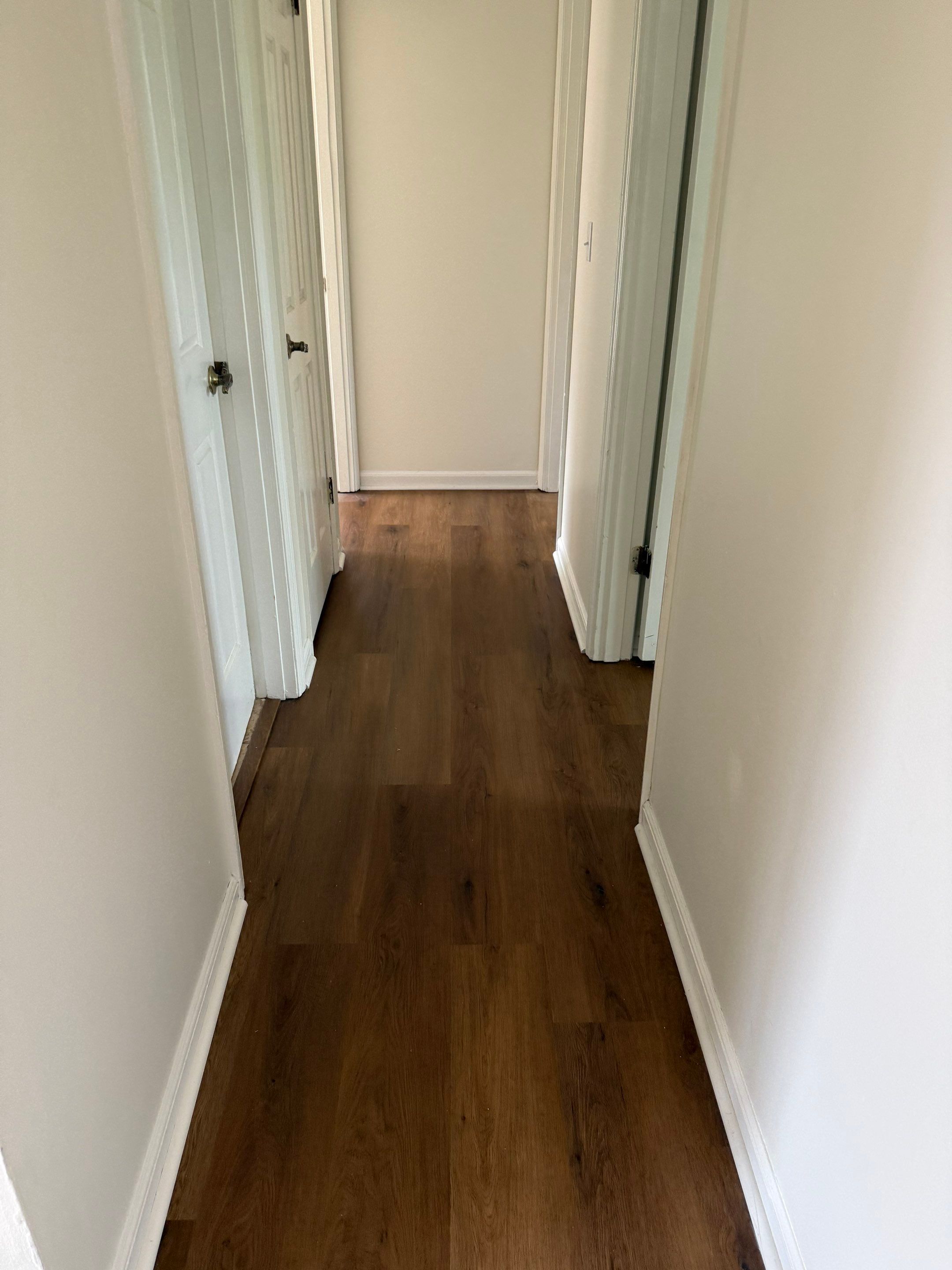 Complete Home Remodel Featuring Custom Kitchen and Wood-Look Plank Flooring by MAJO
