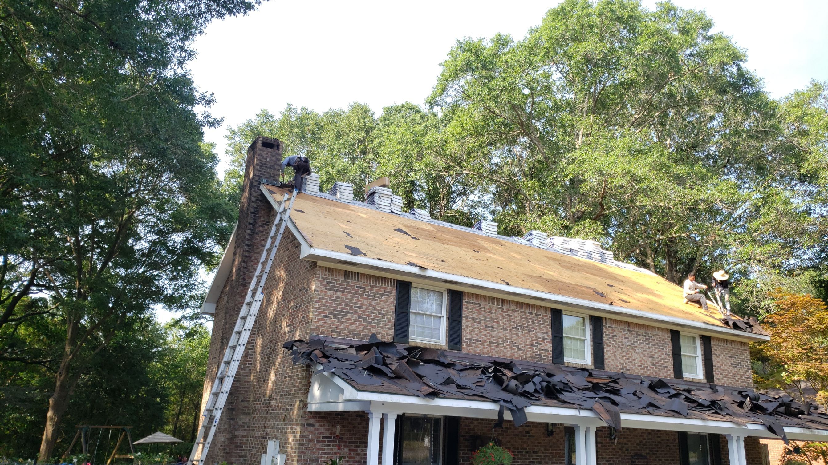 Residential Roofing Installation using Roof Replacement by American Roofing & Construction LLC