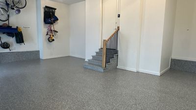 Max R. upgraded his garage with overhead racks and a New floor 