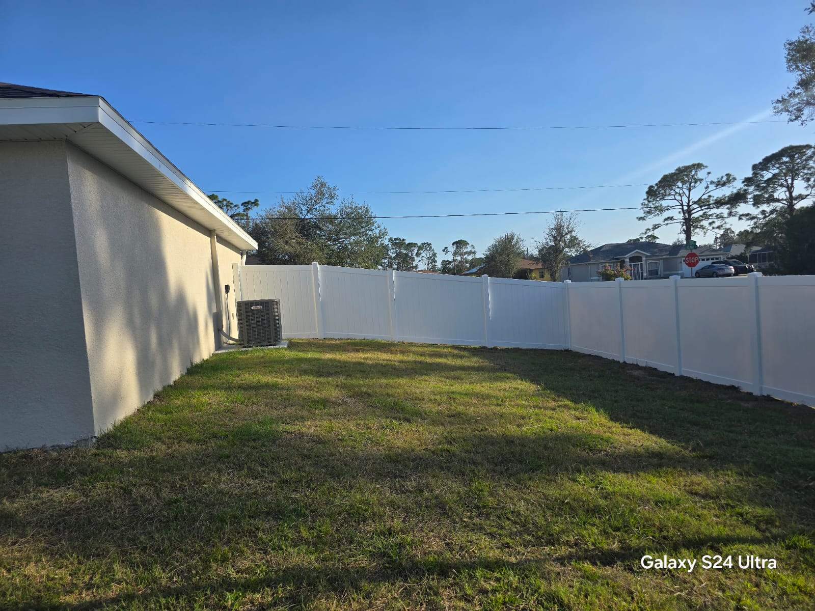 Residential White Vinyl Privacy Fence Installation in North Port by True Fence LLC