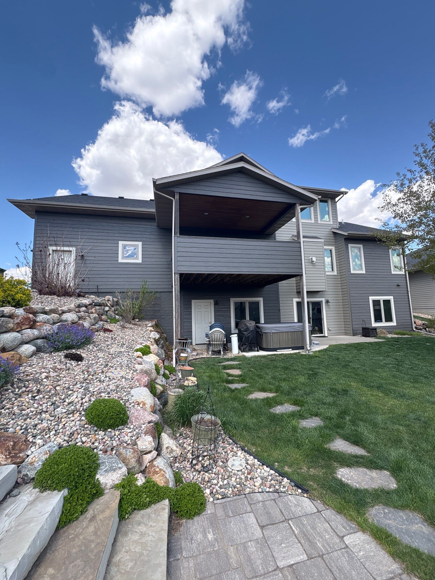 Residential Exterior Painting and Color Update in Sioux Falls by Select Painting, Coatings & Garage Cabinets