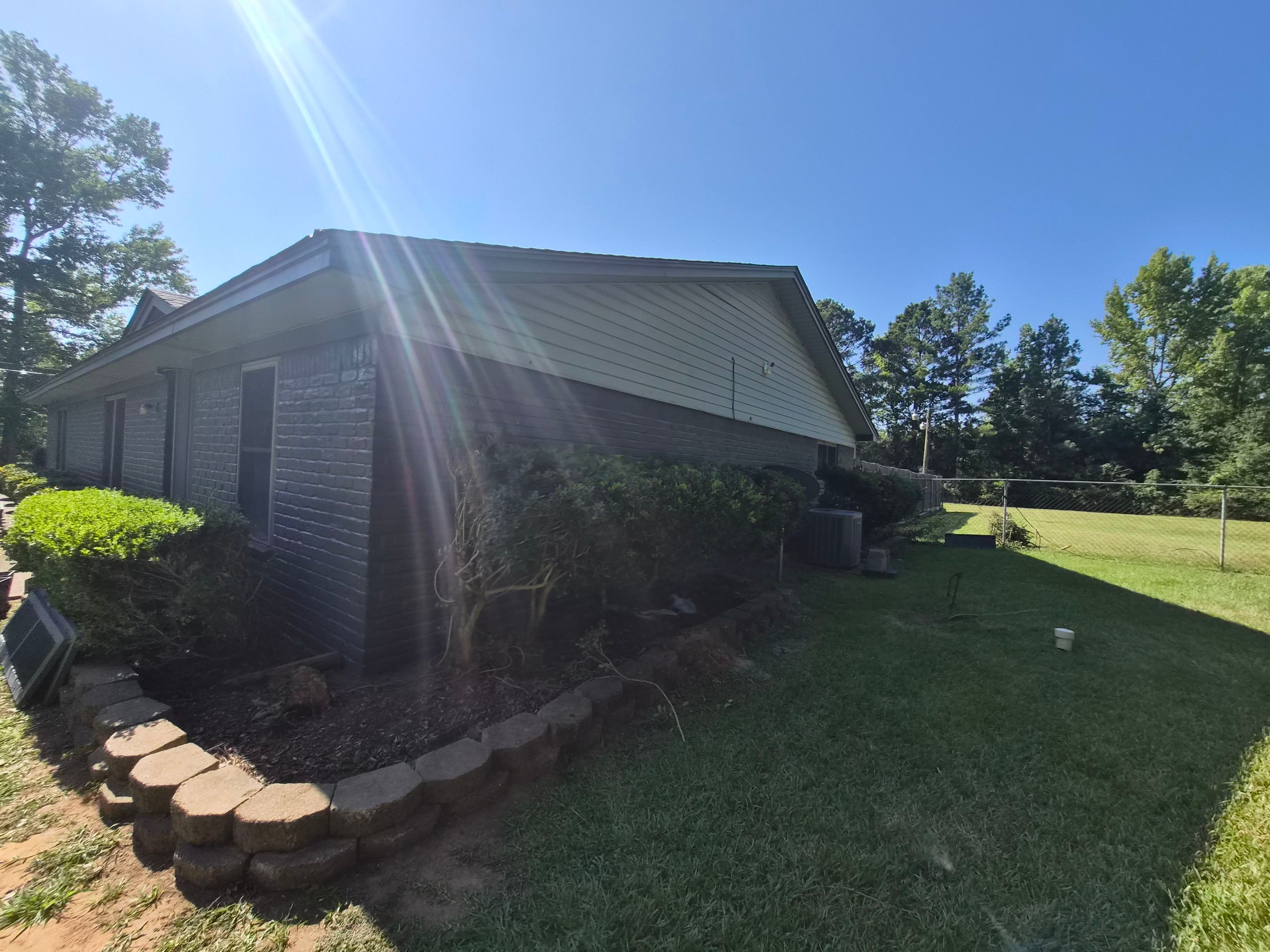 Exterior Refresh Brick Painting Job in Overton, TX by Quality Coats Painting