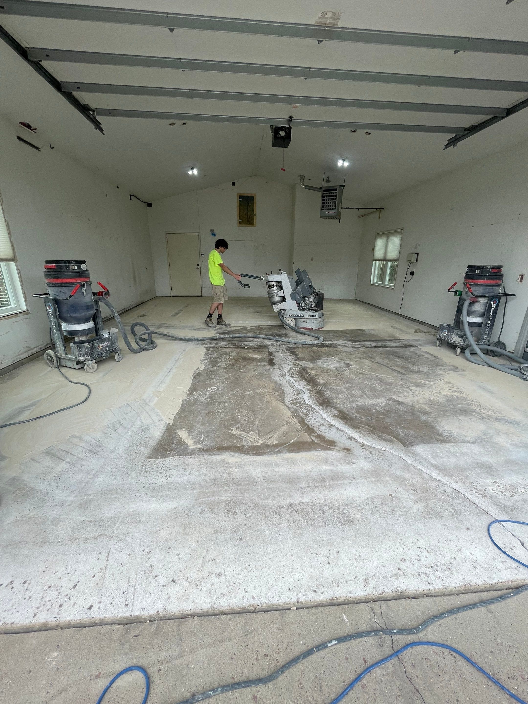 Coyote Flake Concrete Coating for Sioux Falls Garage by Select Painting, Coatings & Garage Cabinets