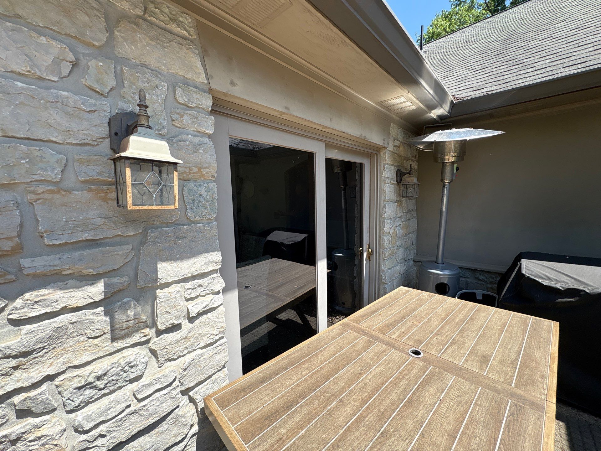 Custom Front Entry and Sliding Patio Door Replacement in Greenwood by Merrifield Exteriors, LLC