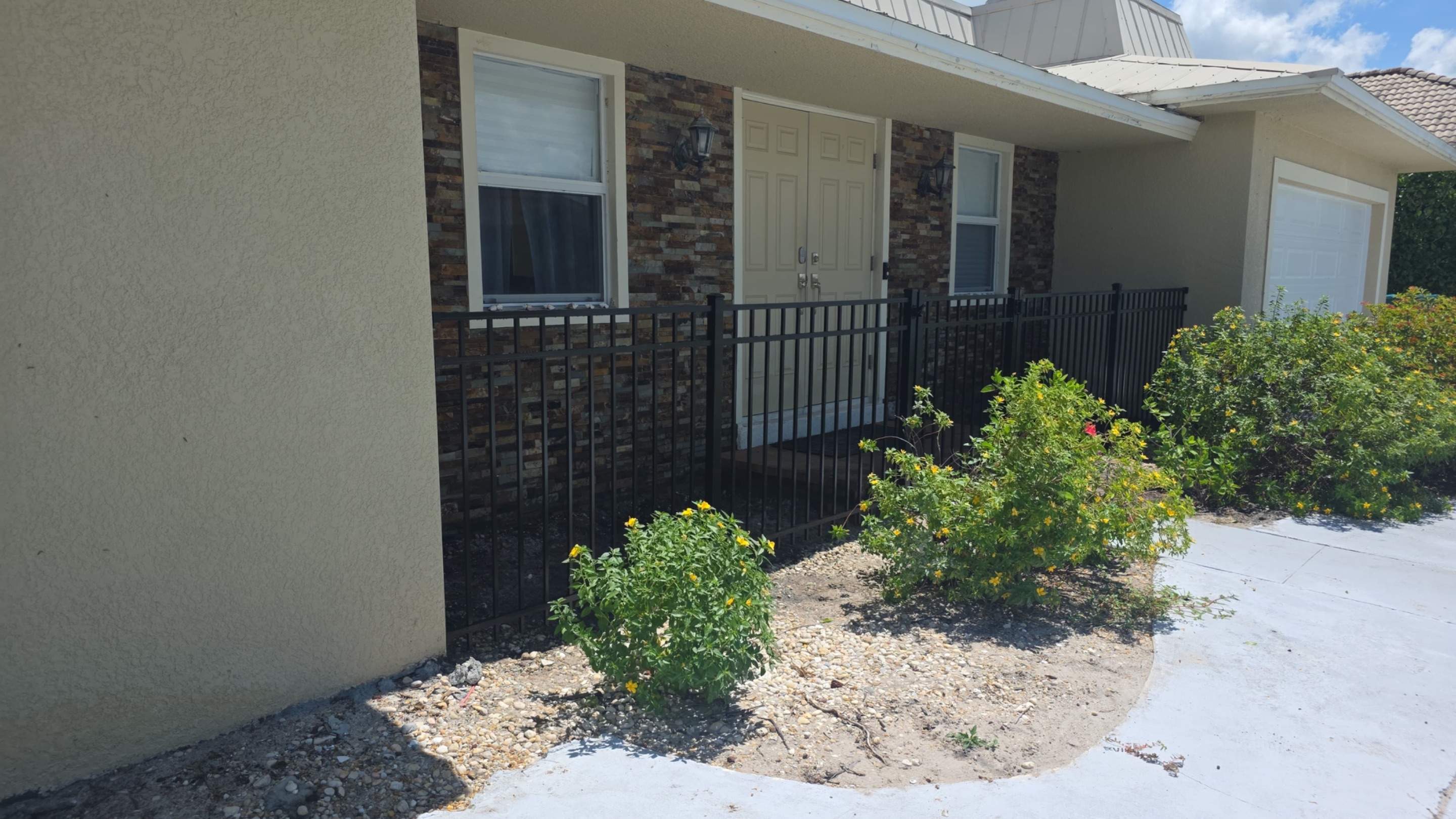 Black Aluminum Picket Fence Installation in Marco Island by True Fence LLC