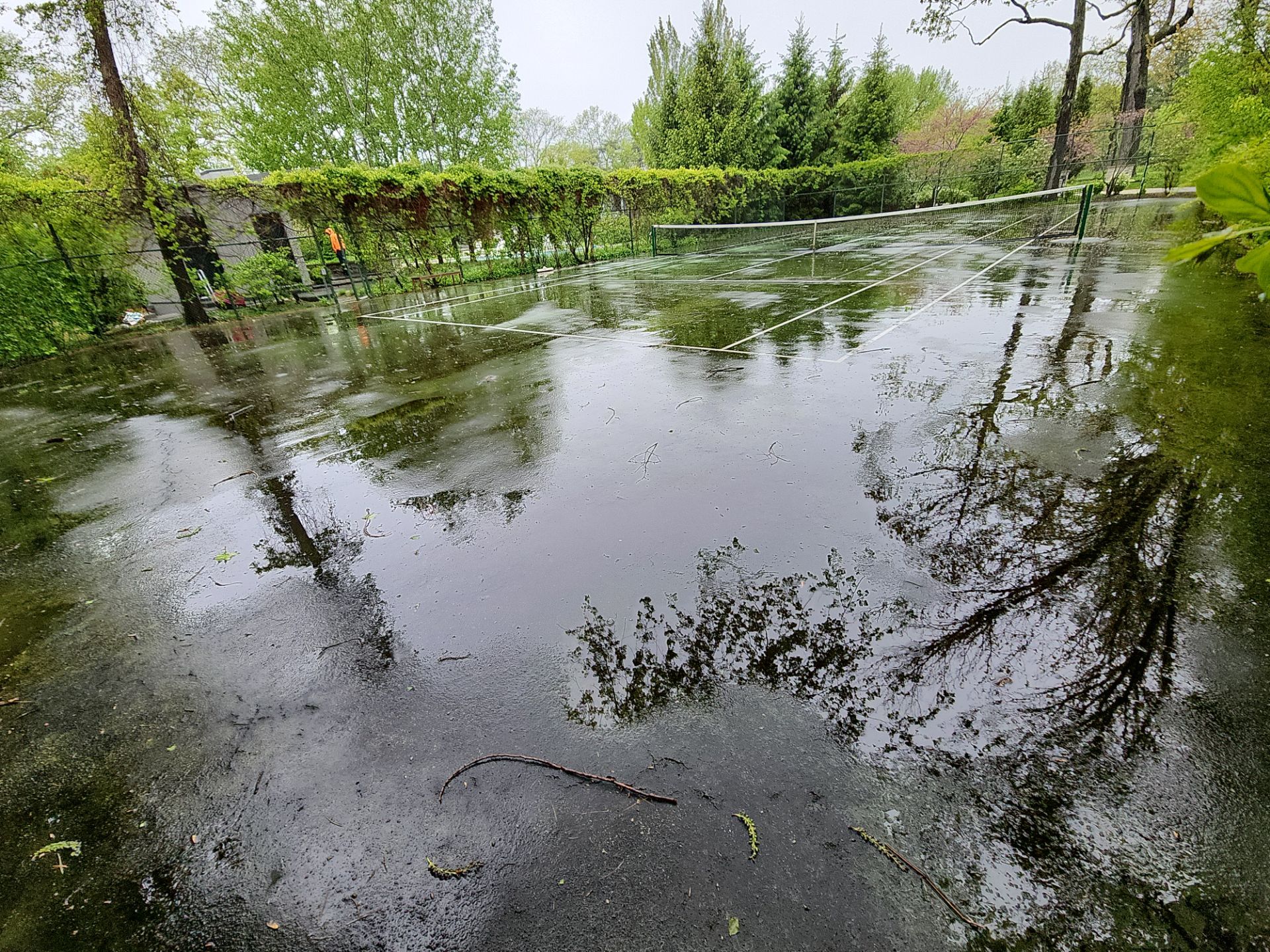 Tennis Court using Algaecide, soft wash soap by Northern Power Washing LLC.