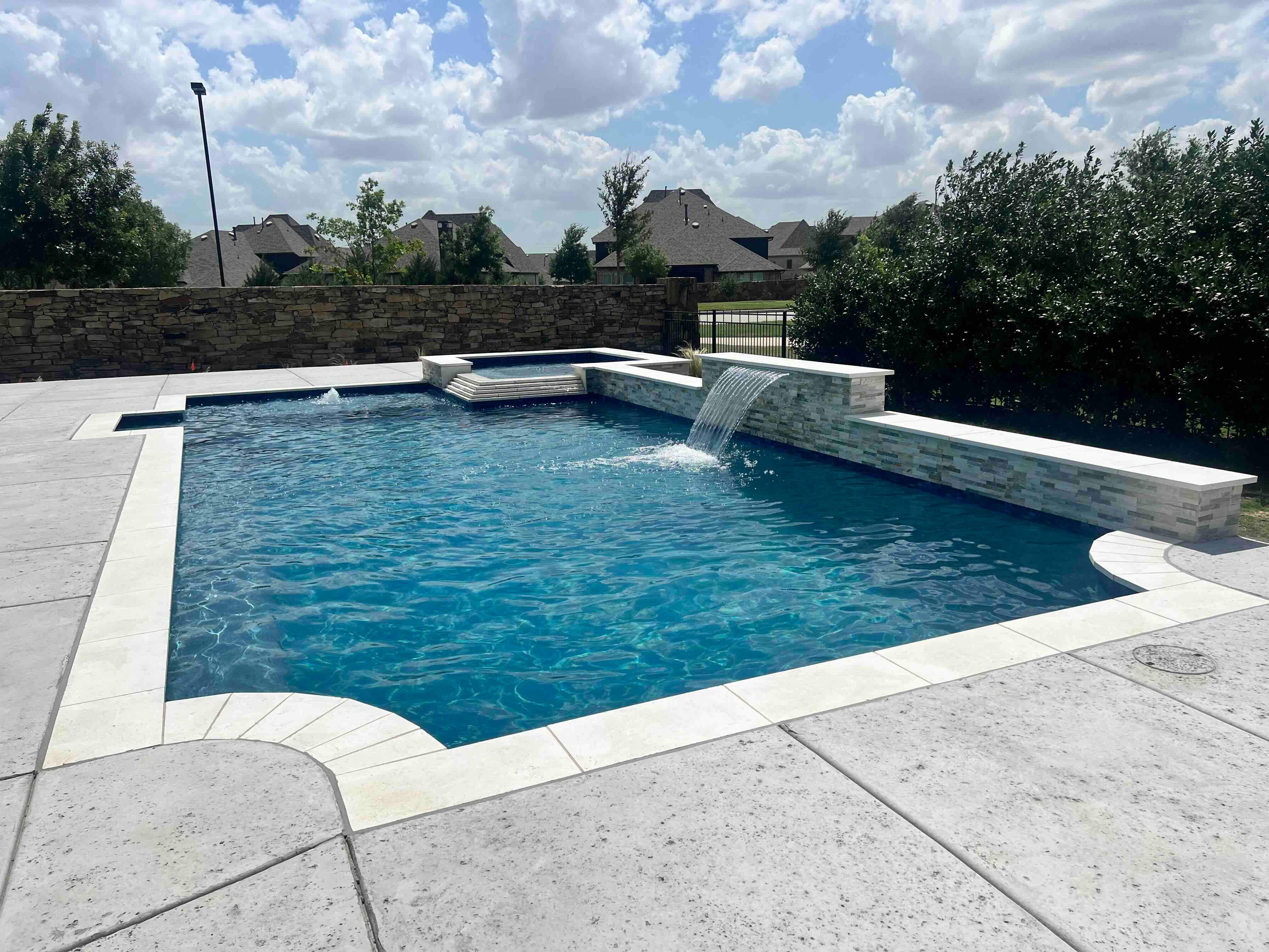 Geometric Pool with Raised Spa by Pinnacle Pools and Spas - DFW
