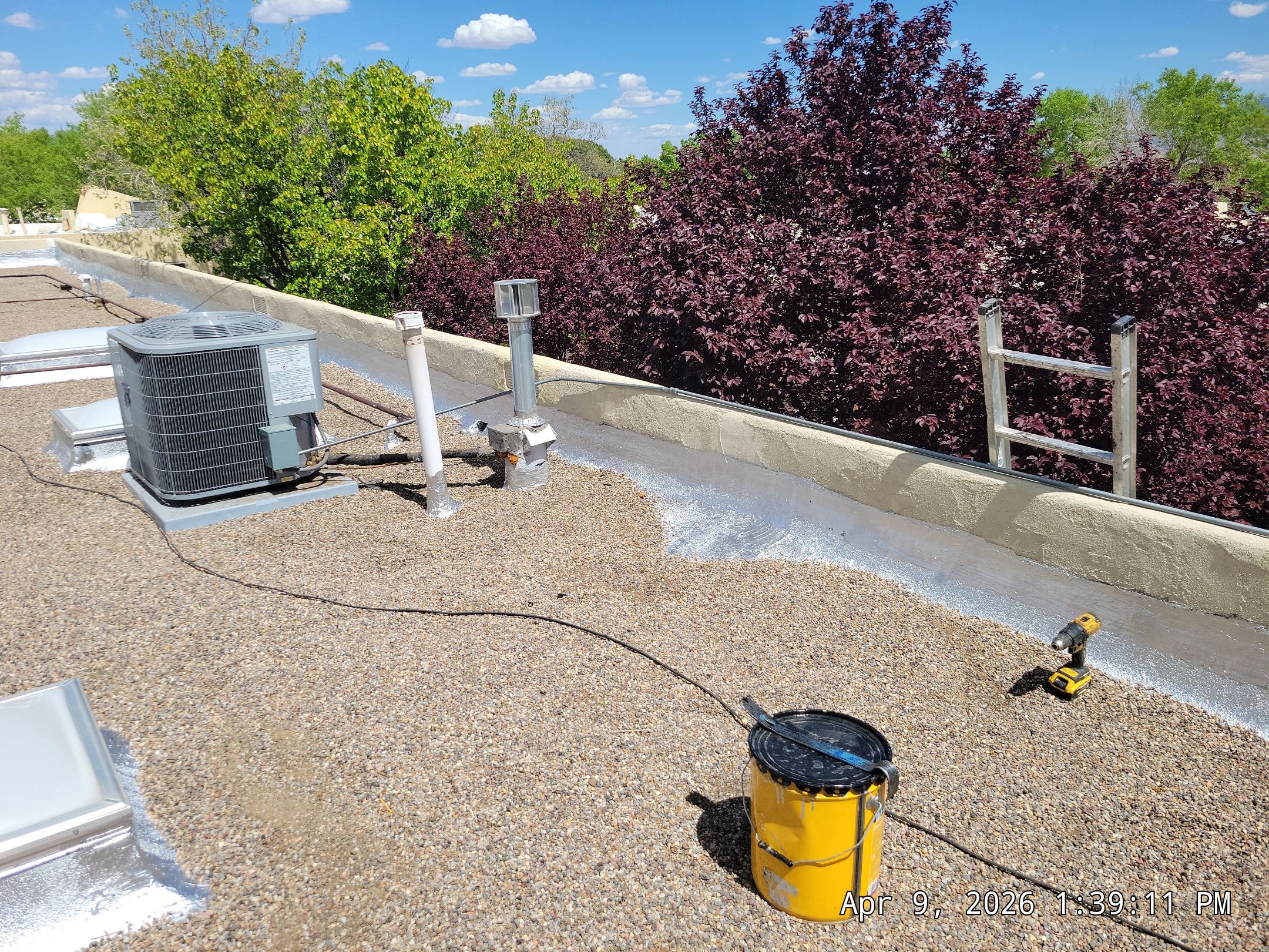Tar and Gravel Roof Maintenance and Skylight Sealing in Rio Rancho by Doyle Roof Masters Inc