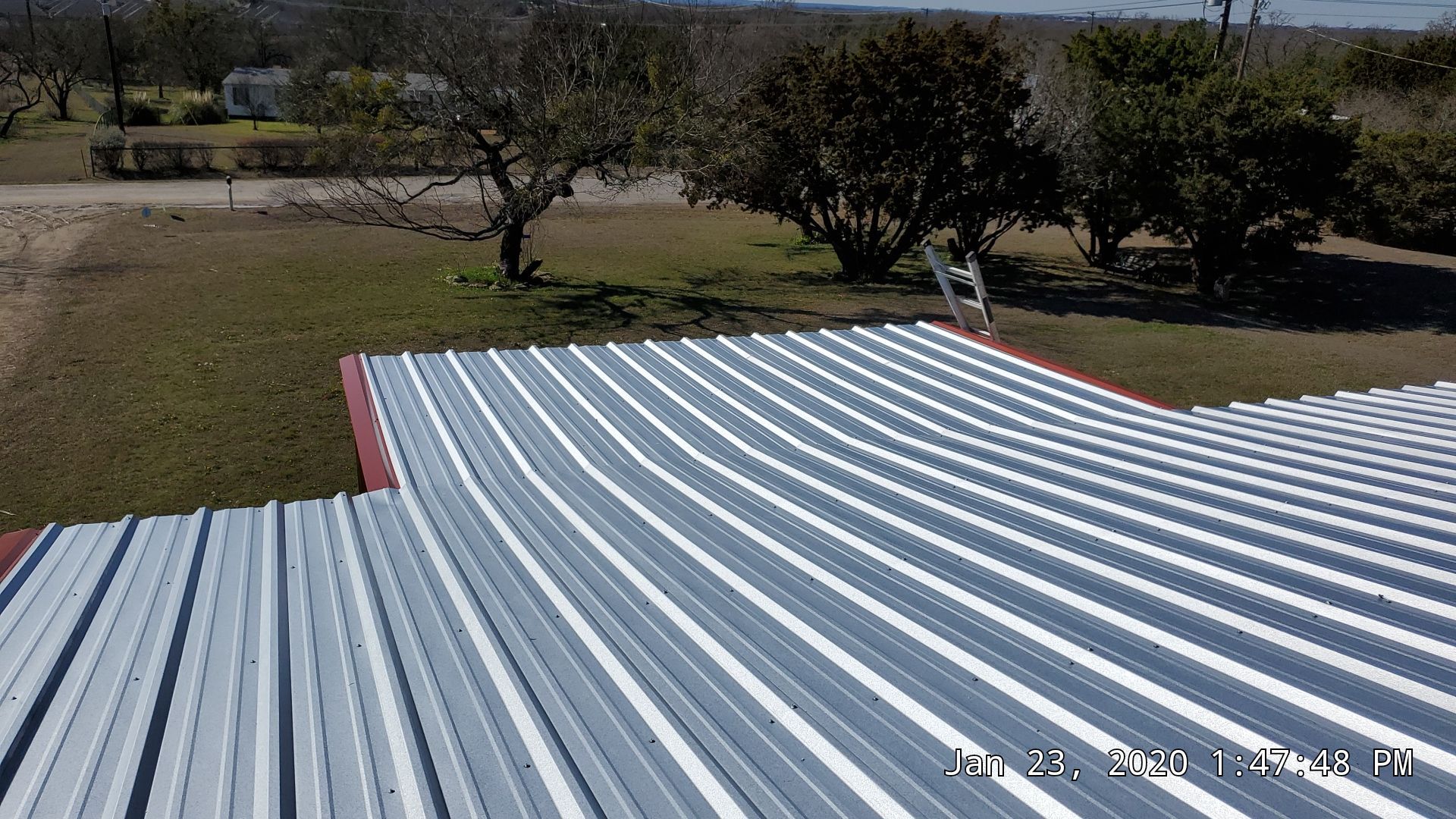 Residential Roofing Installation using PBR Metal Roof by Harvey Roofing & Construction