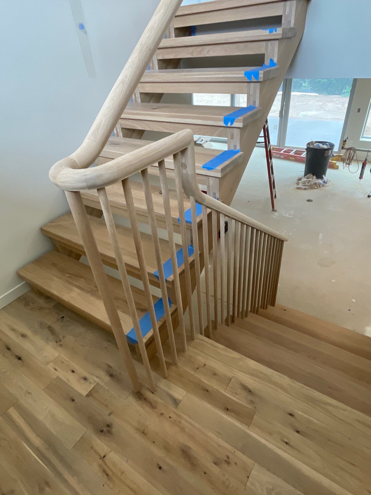 Hand Carved Staircase steals the show by RTBaldwin Hardwood Floors