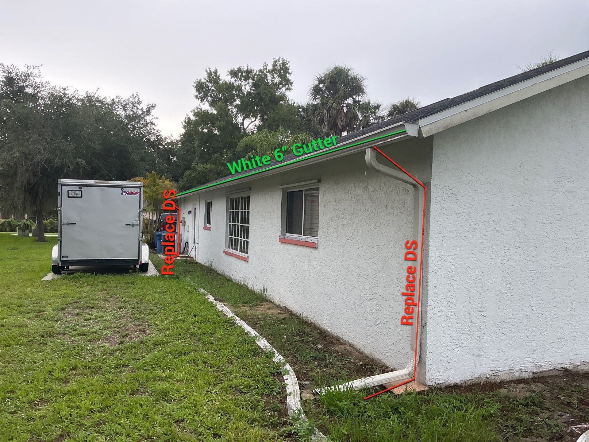 White Seamless Gutters with Splash Guards in North Fort Myers FL by Gutter Professor   by Gutter Professors