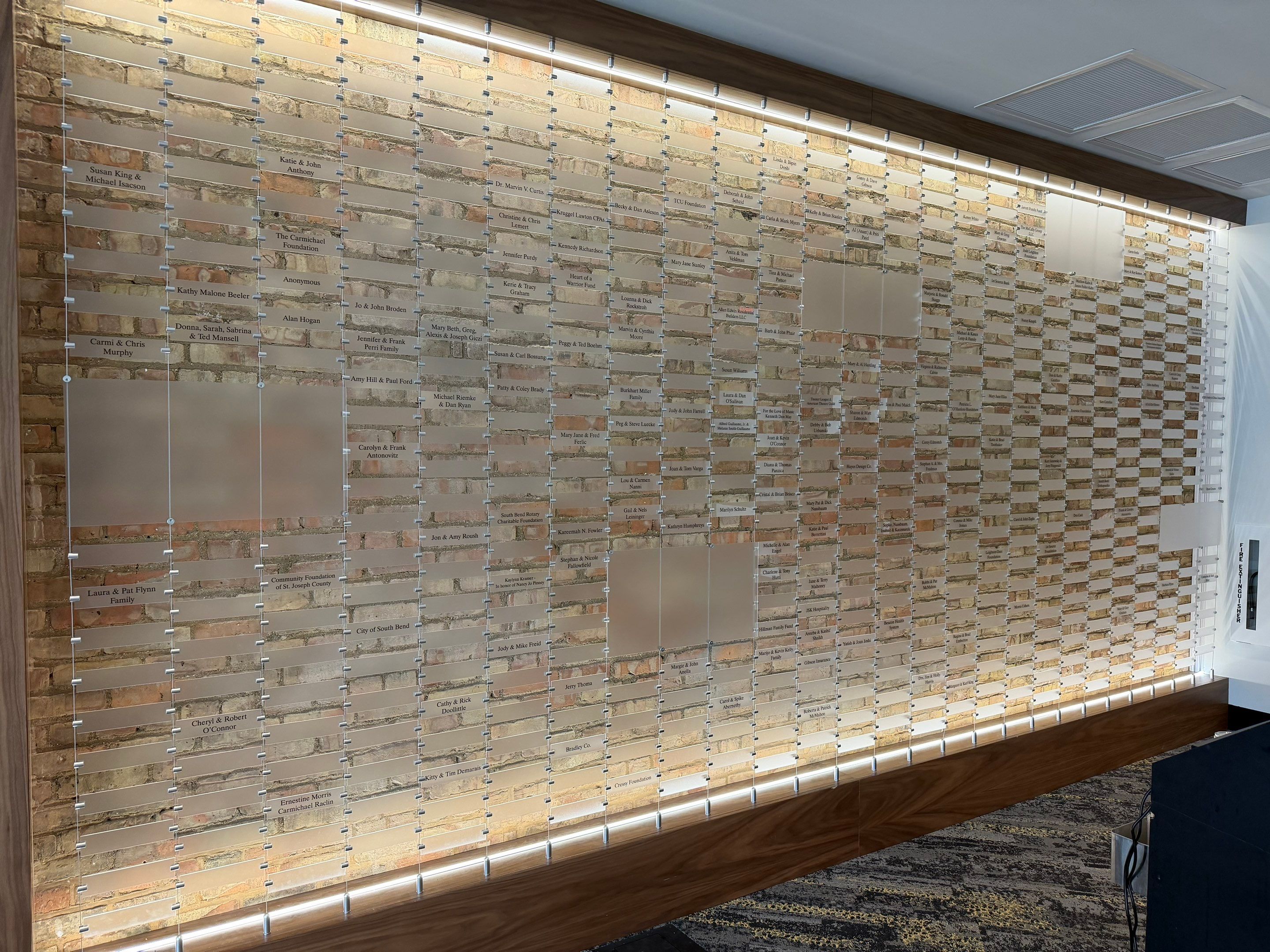 Custom Donor Recognition Walls and Wayfinding for Cultural Arts Center by Hayes Design co