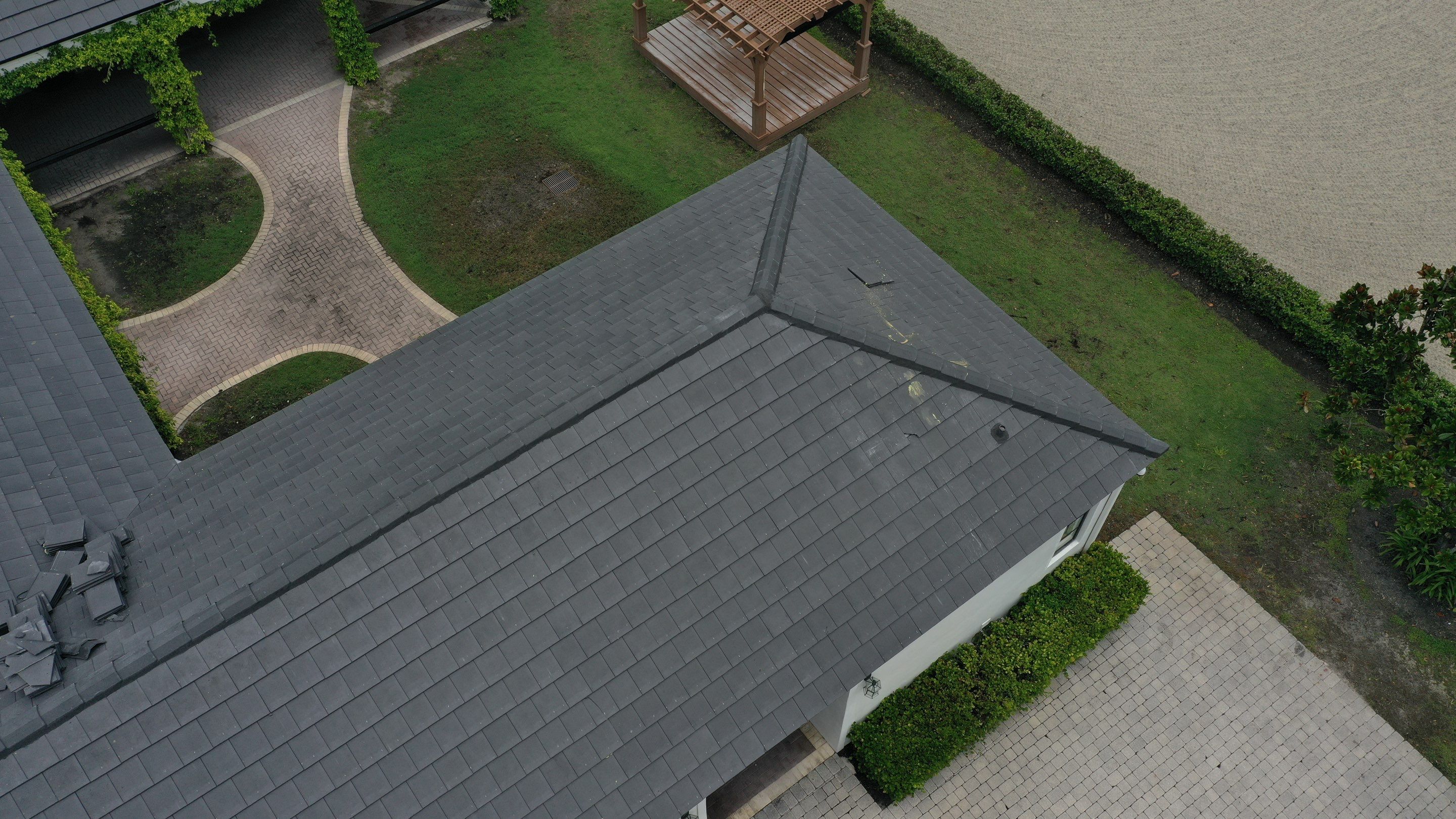 3612 Aiken Ct. Wellington FL - Westlake Newpoint Saxony 900 Slate - Charcoal Grey by Total Roofing System The Metal Roof Experts