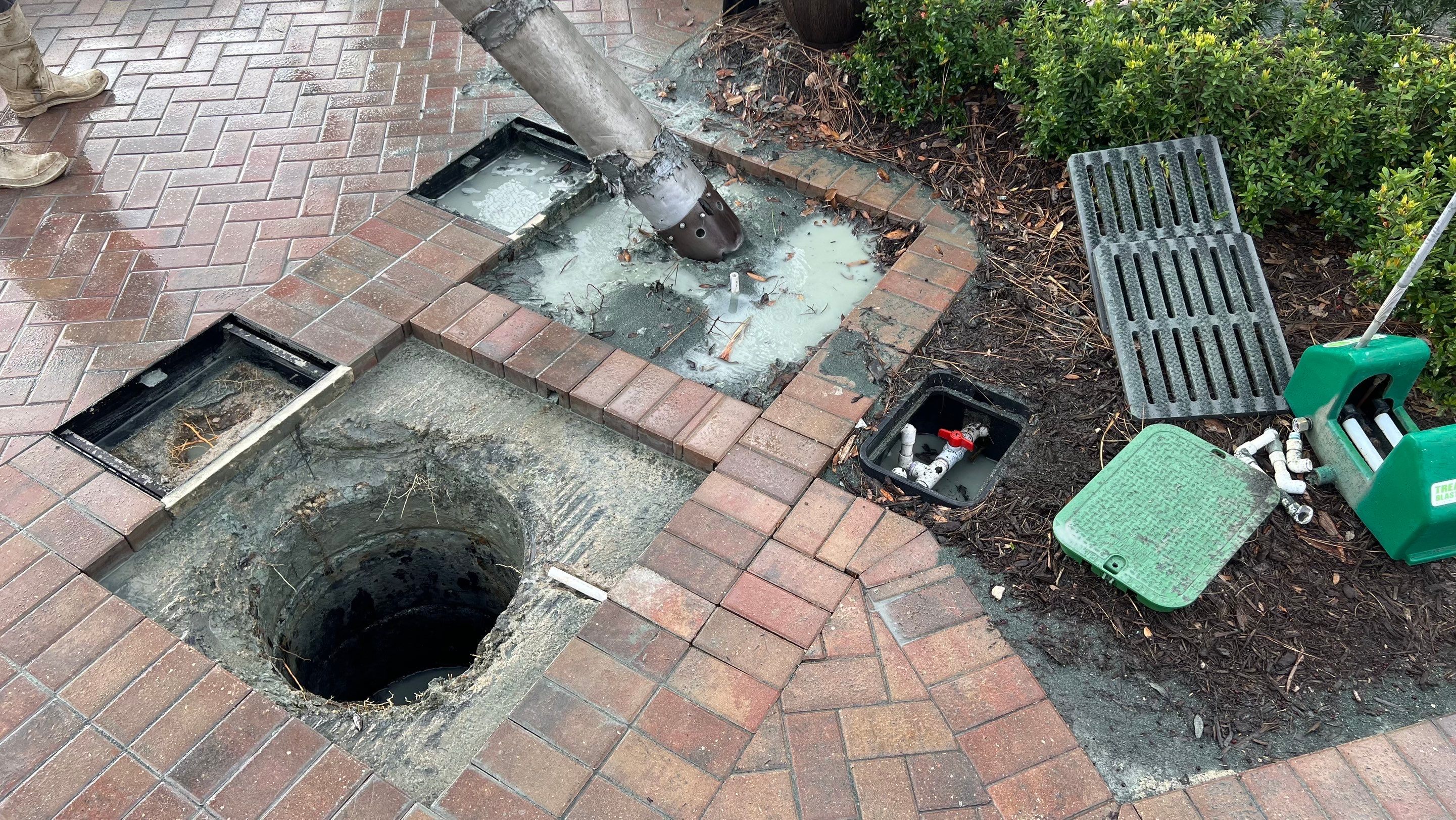 Pelican Landing Tennis Court Catch Basin Cleaning by APS Power & Water