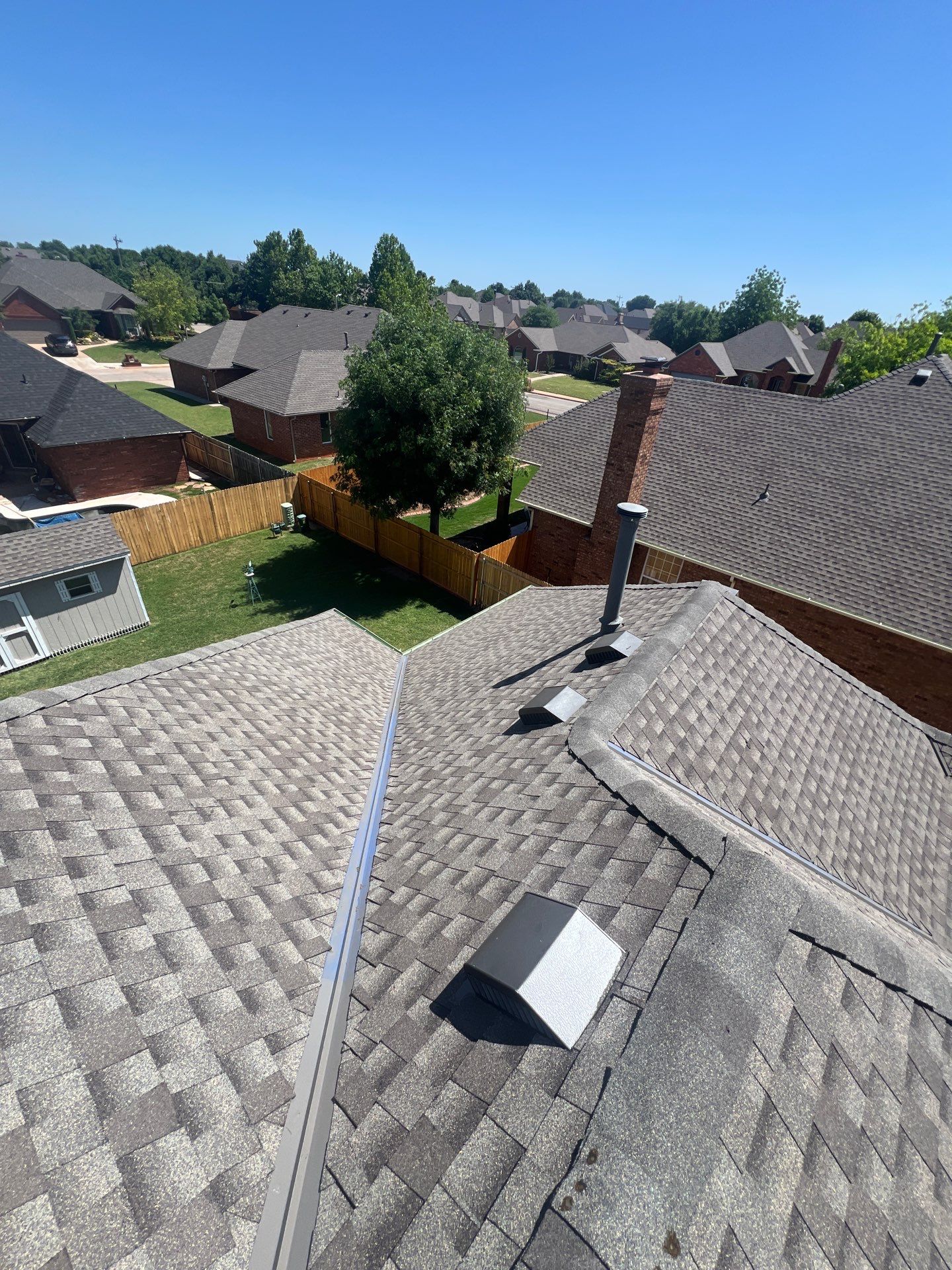 roof, vents & skylight replacement in Edmond by McCann's Roofing and Construction