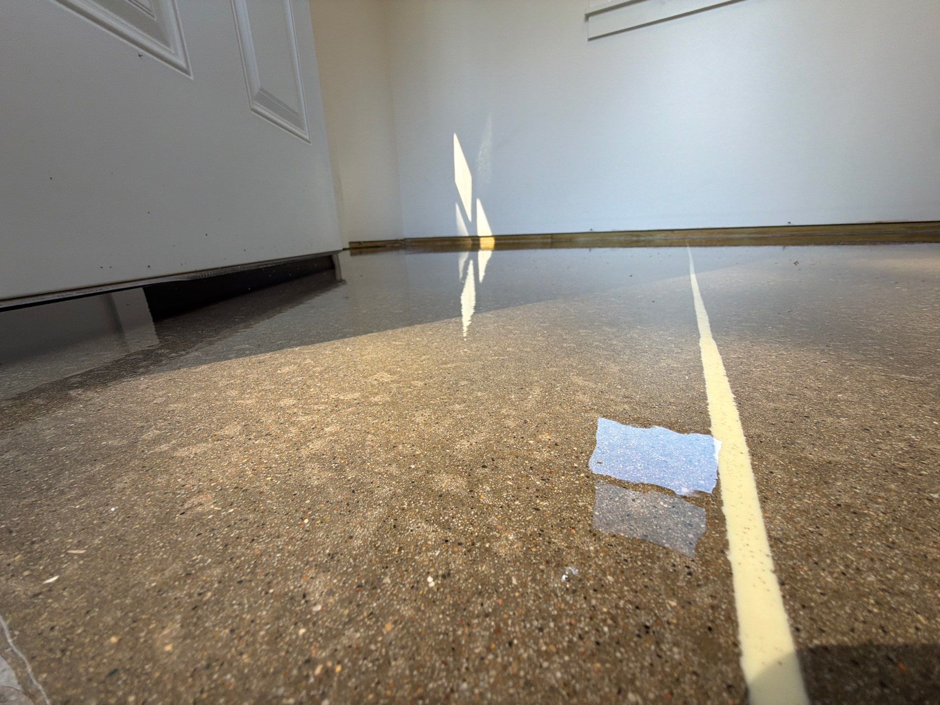 Speckled Epoxy Floor Installation and Concrete Refinishing in Nunica by Gordon Painting