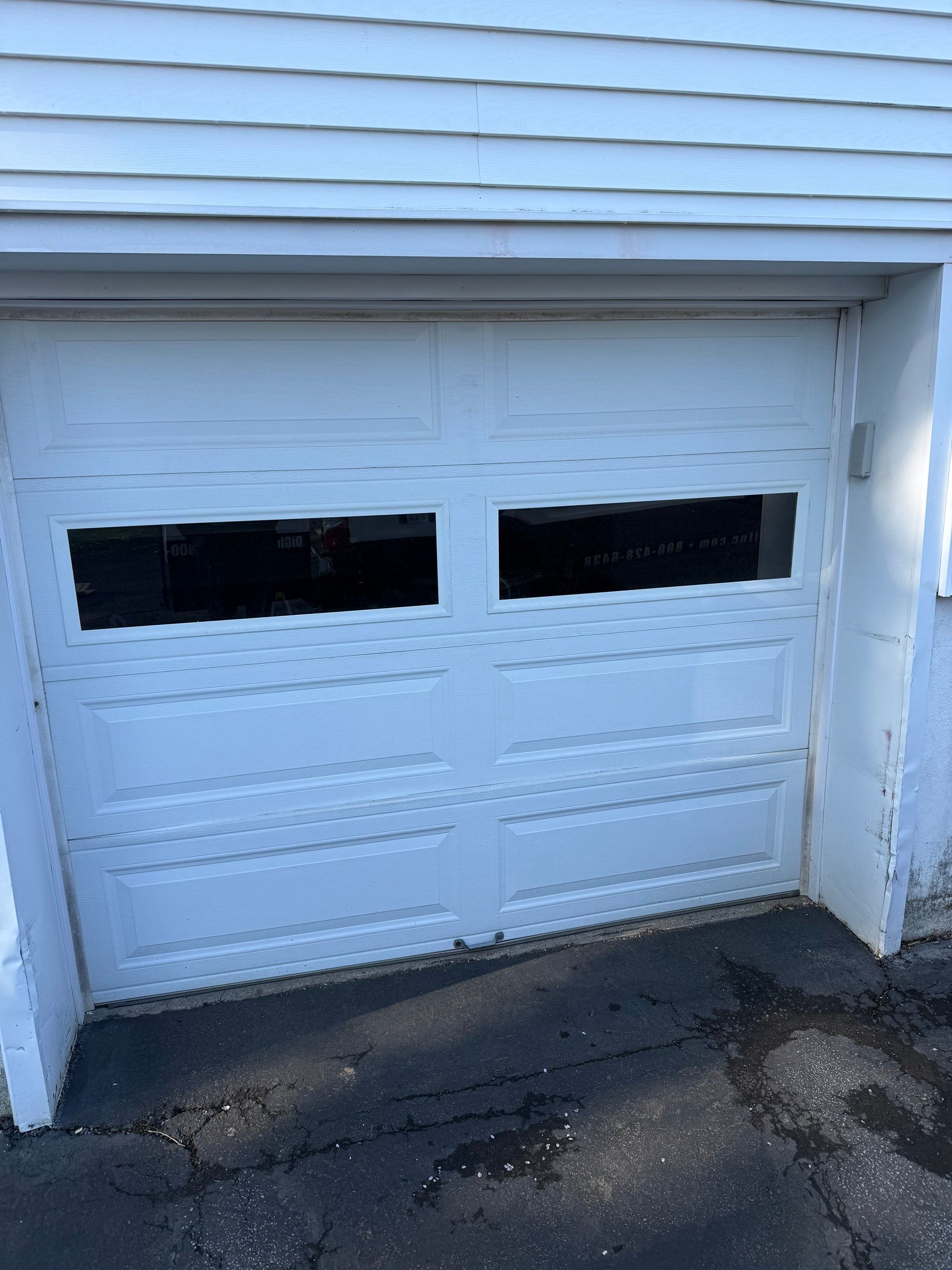 Garage Door Replacement by DiGiorgi Roofing and Siding Inc
