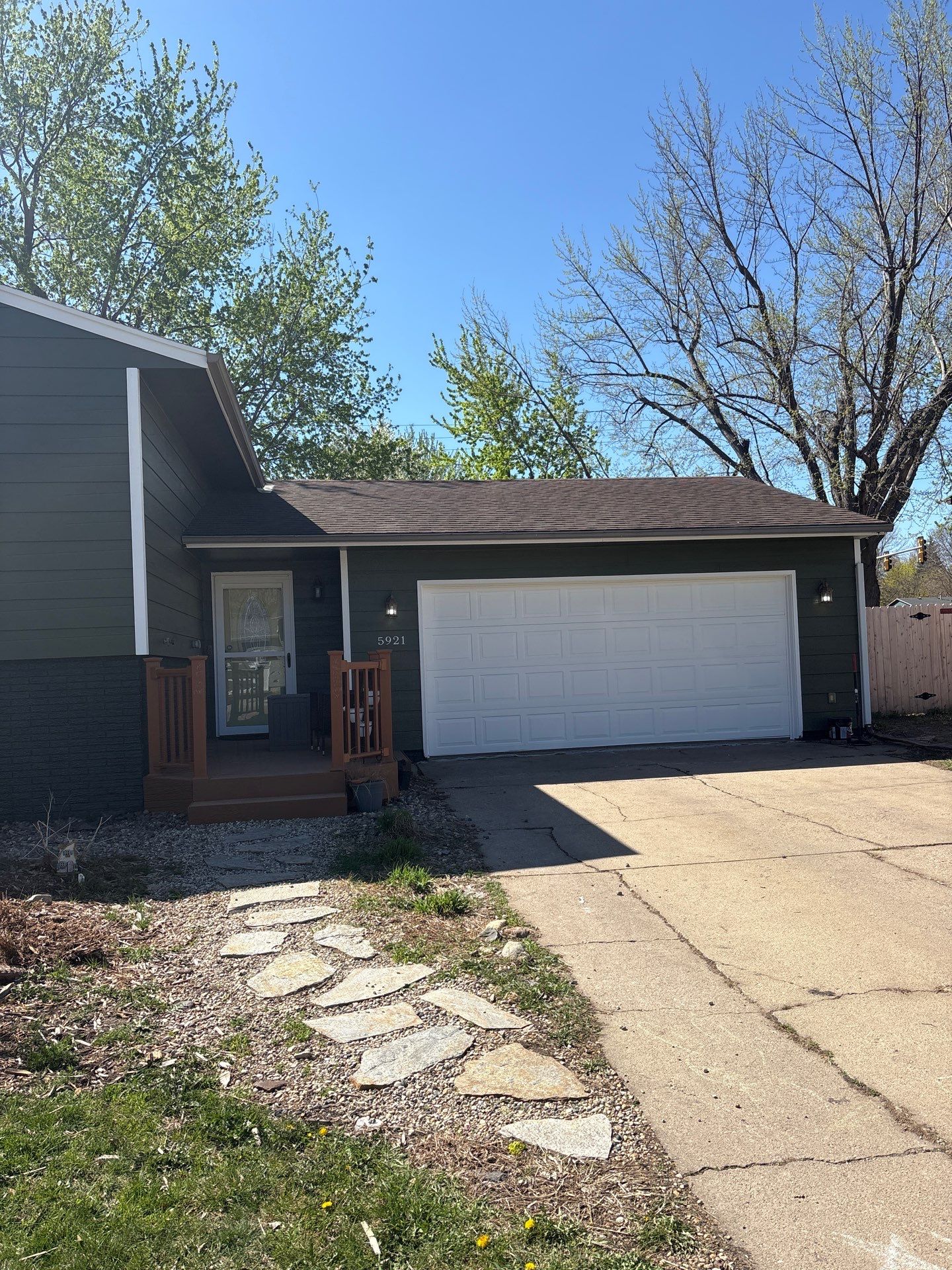 Full Exterior House Painting and Foundation Refinishing in Sioux Falls by Select Painting, Coatings & Garage Cabinets