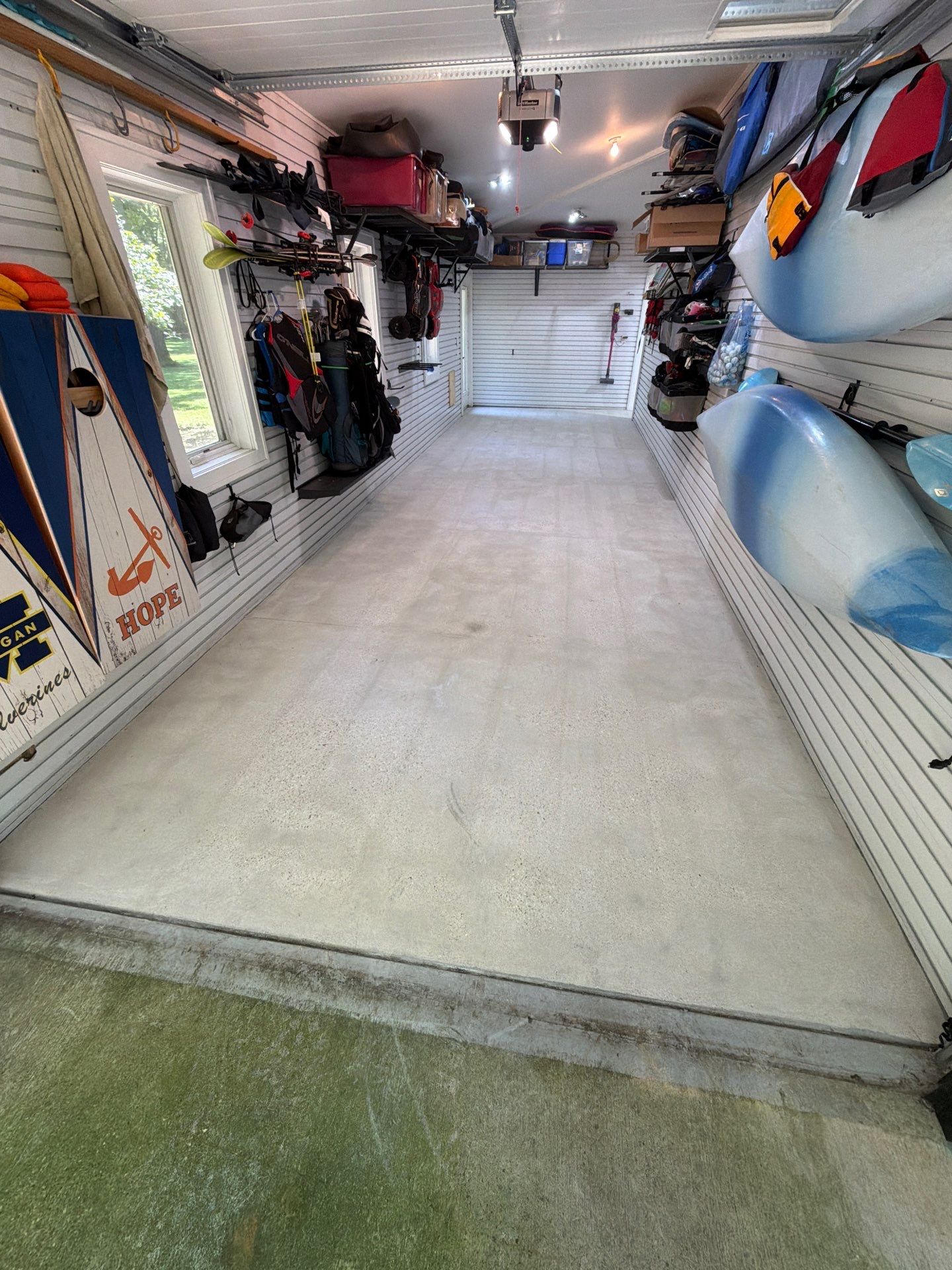 Residential Garage Epoxy Flake Floor Installation in Grand Haven by Gordon Painting