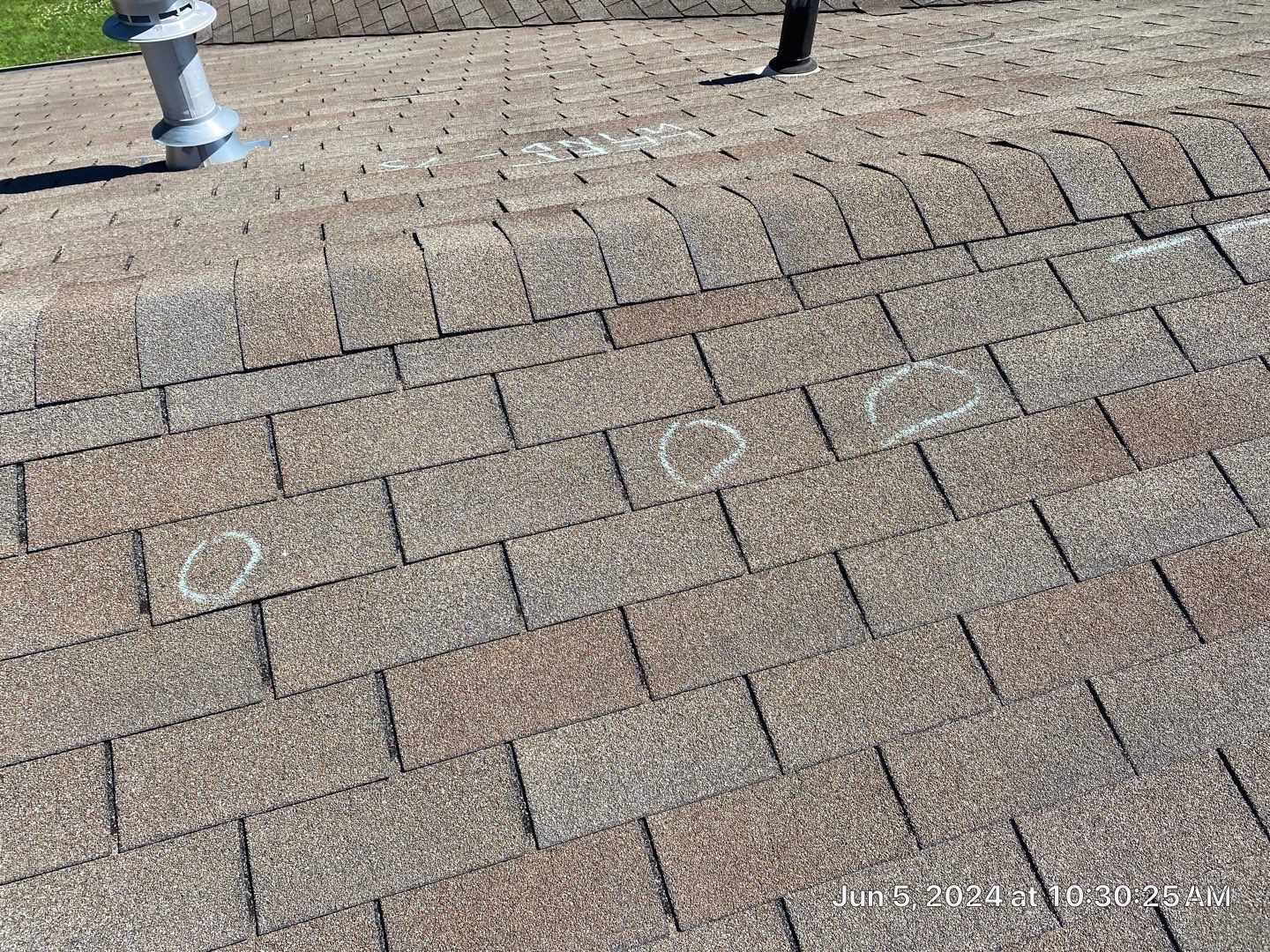 Roof inspection in Bartlesville by Decor Roofing & Restoration