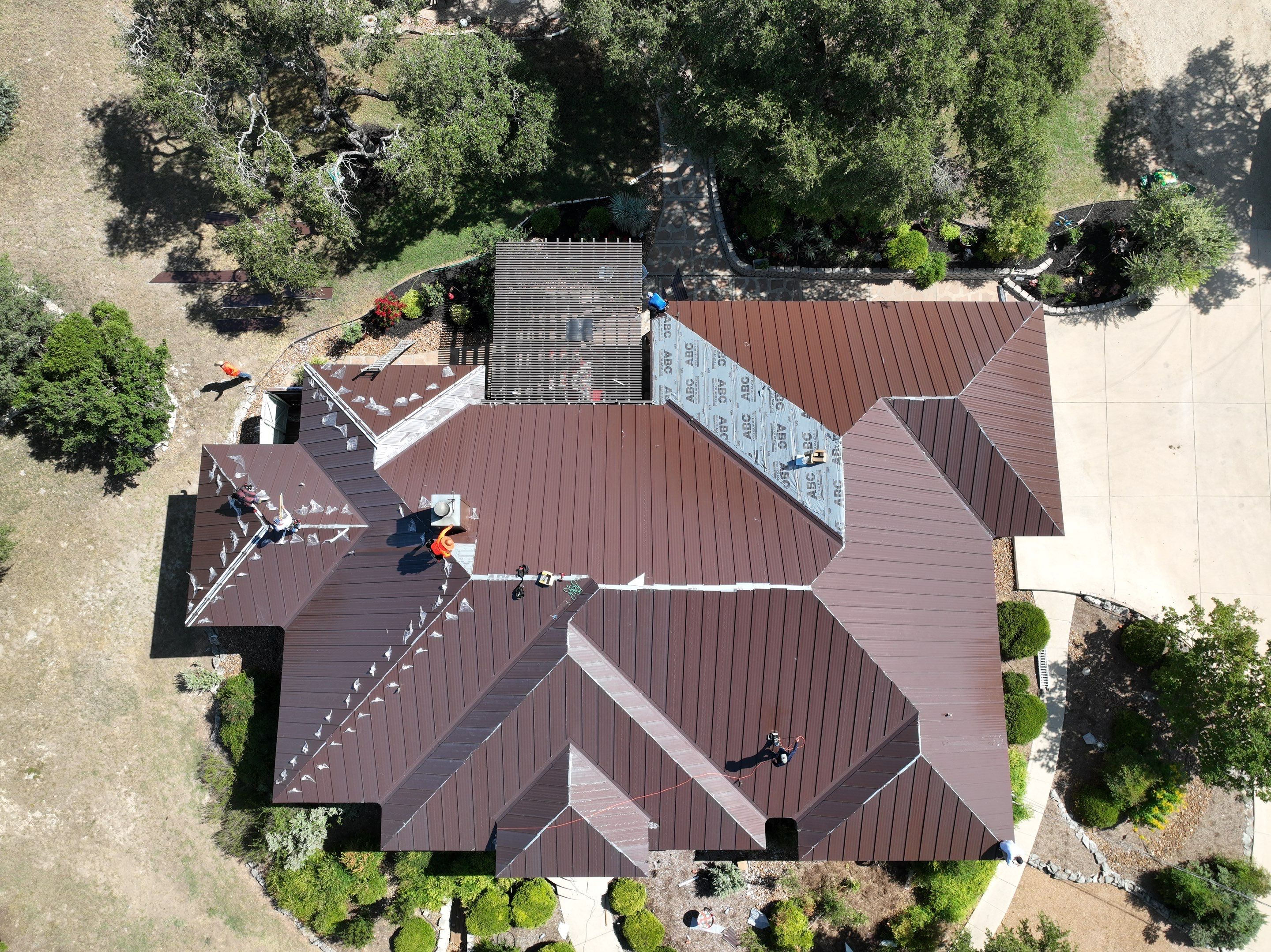 Residential Metal Roof Installation using McElroy Metal by Premier Roofing and Contracting