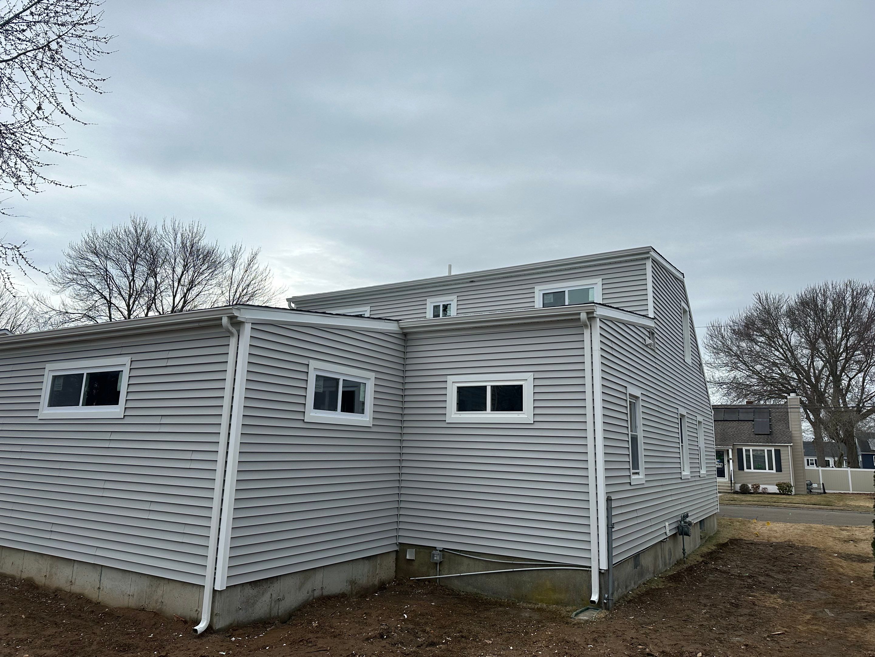 Siding Installation using CertainTeed Monogram Vinyl Siding - D4 - Sterling Gray by A Plus Exterior