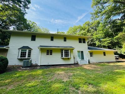 Great Falls: Siding Replacement with James Hardie Statement Beaded Plank in Cobblestone