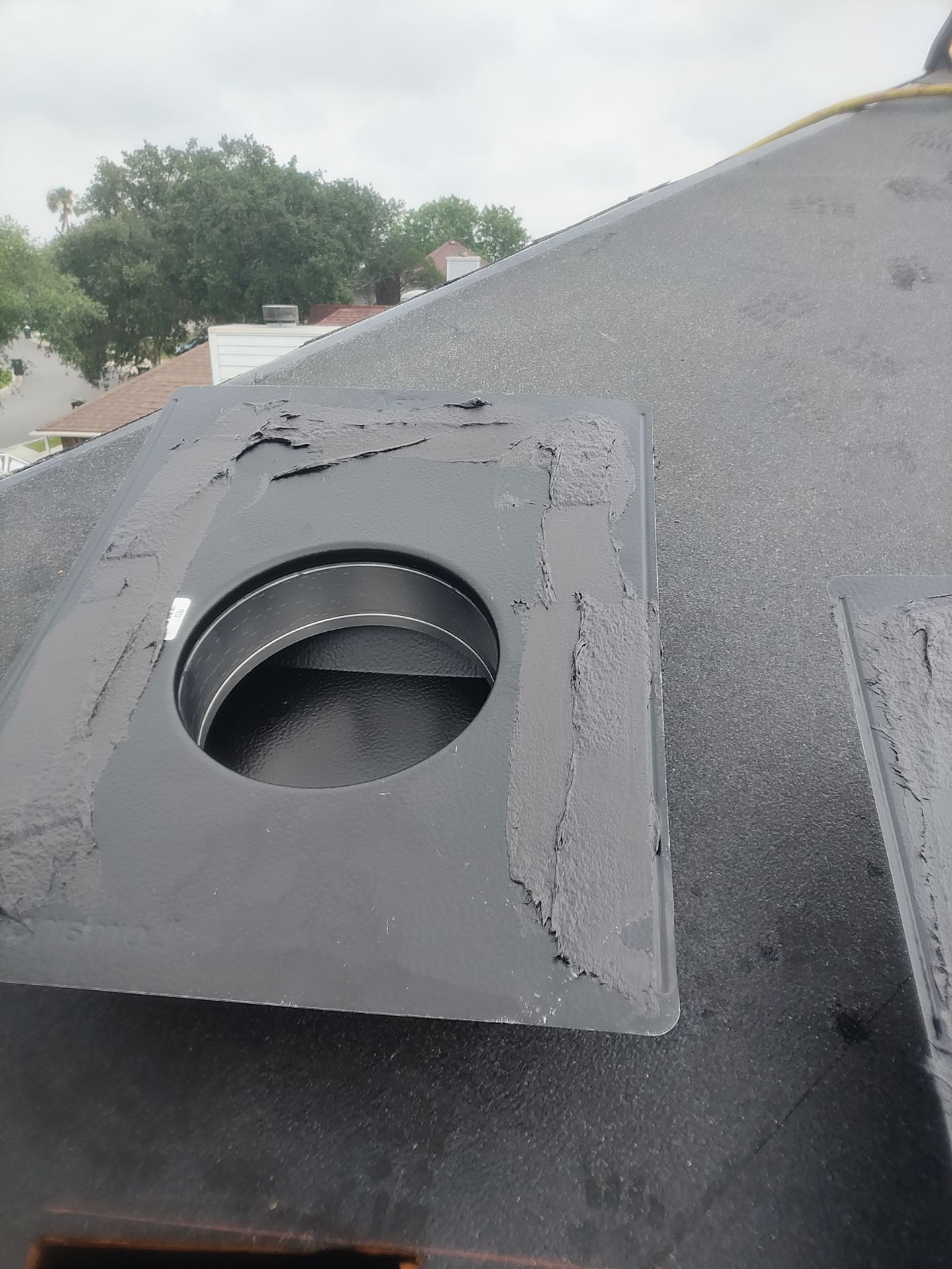 Nothing looks nicer than a little black roof by Bayfront Roofing and Construction