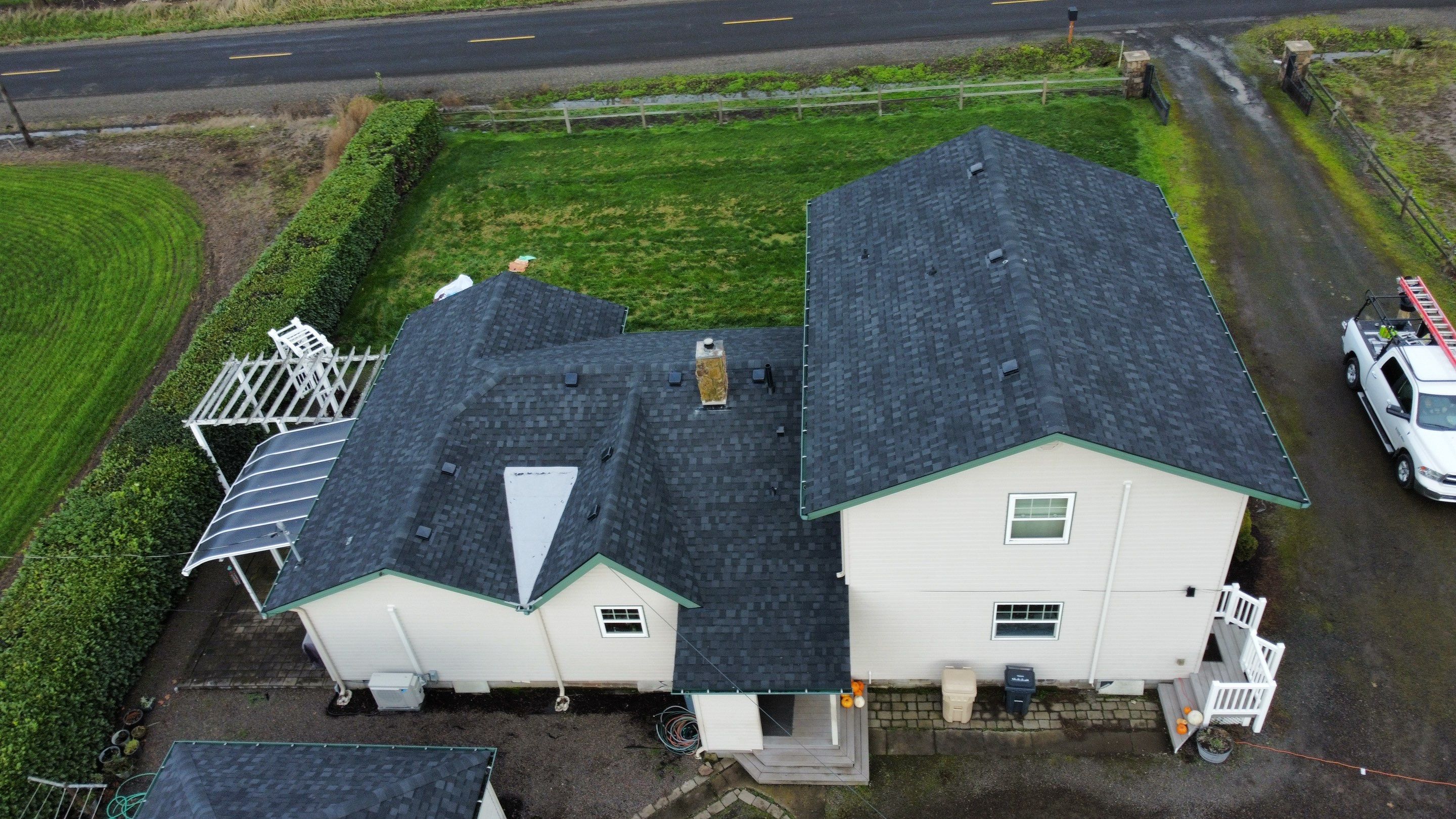 Residential Roofing Installation using IKO Dynasty (Color: Granite Black) by Orezona Building & Roofing Company, Inc.