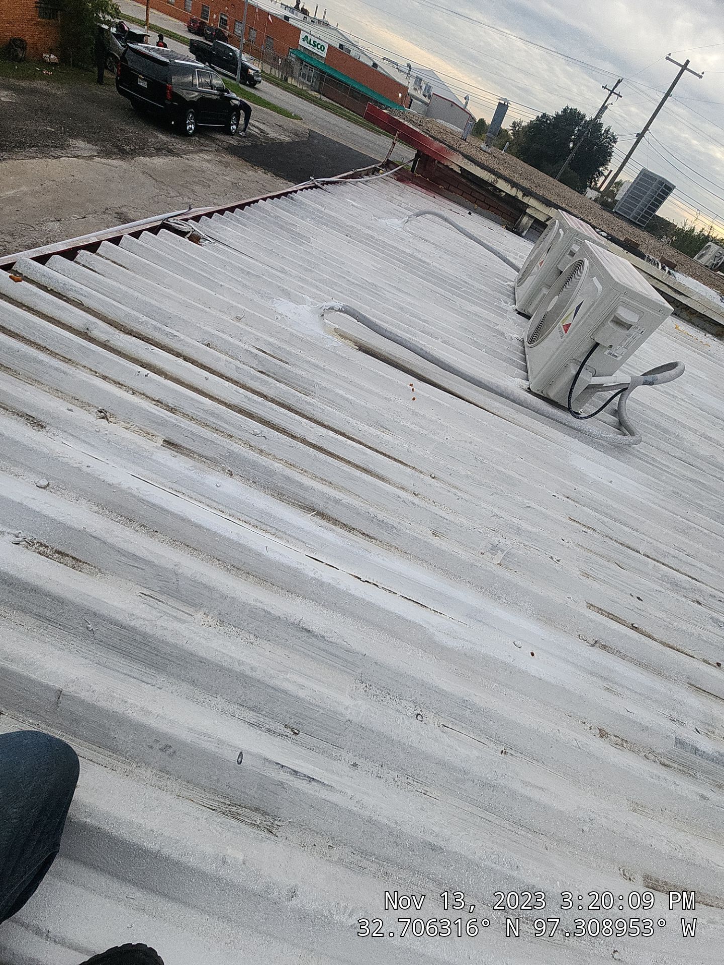 Commercial roofing overlay using GAF TPO over an old ballast roof by Becker Roofing and Exteriors