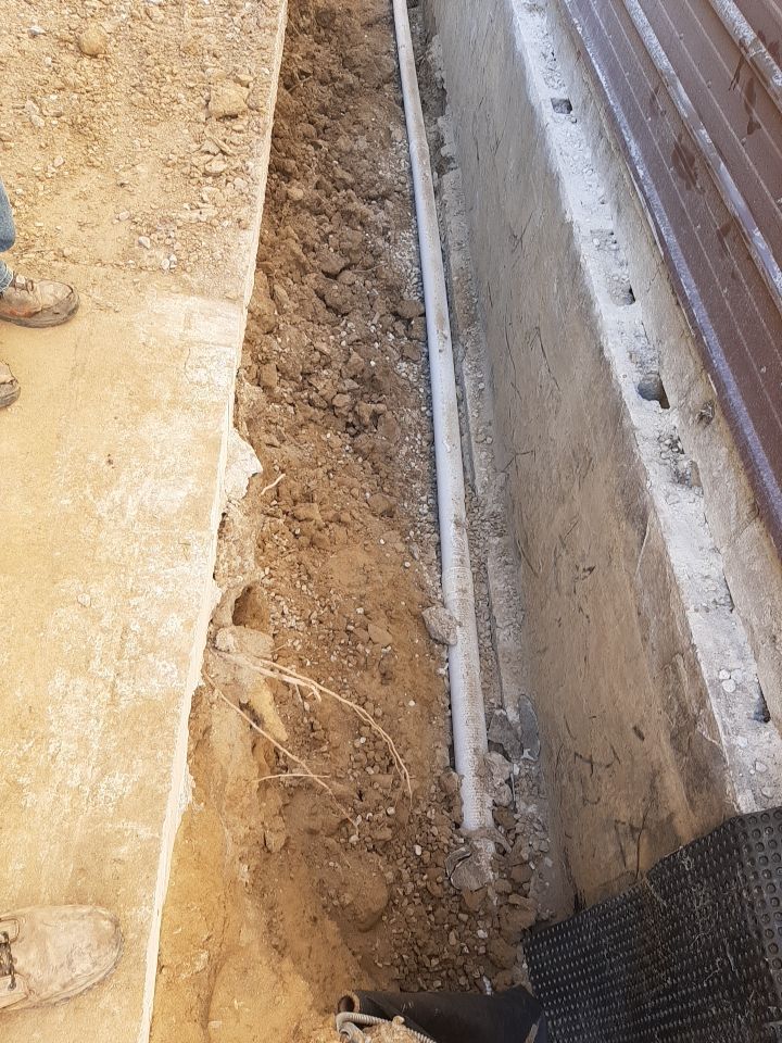 Exterior Deep Waterproofing System with Wall Push Back and Steel Beams Reinforcement by Toledo Basement Repair