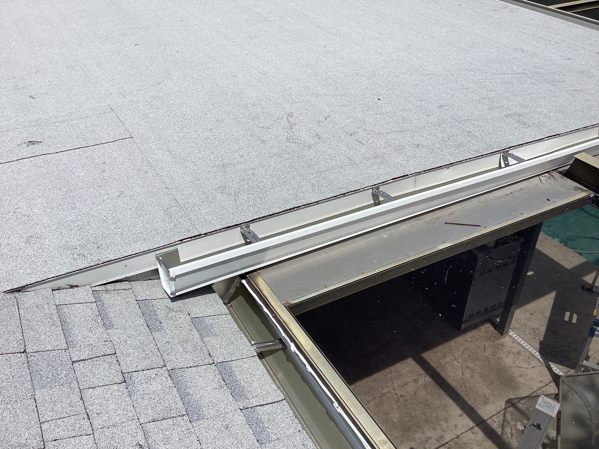 White Seamless Gutters and Splash Guards in Fort Myers FL by Gutter Professor by Gutter Professors