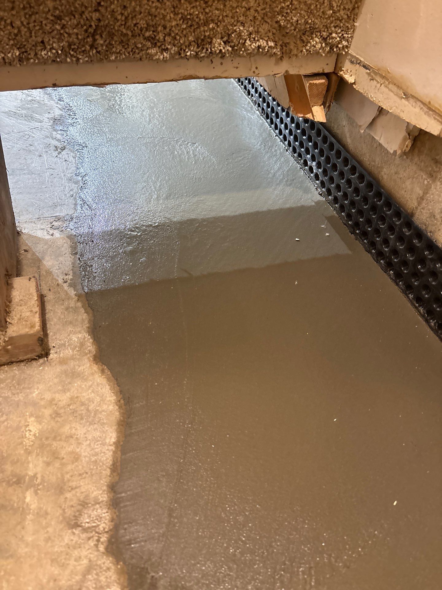 Interior Drain Tile Installation in Minnetonka, MN by Waterproofing Northeast