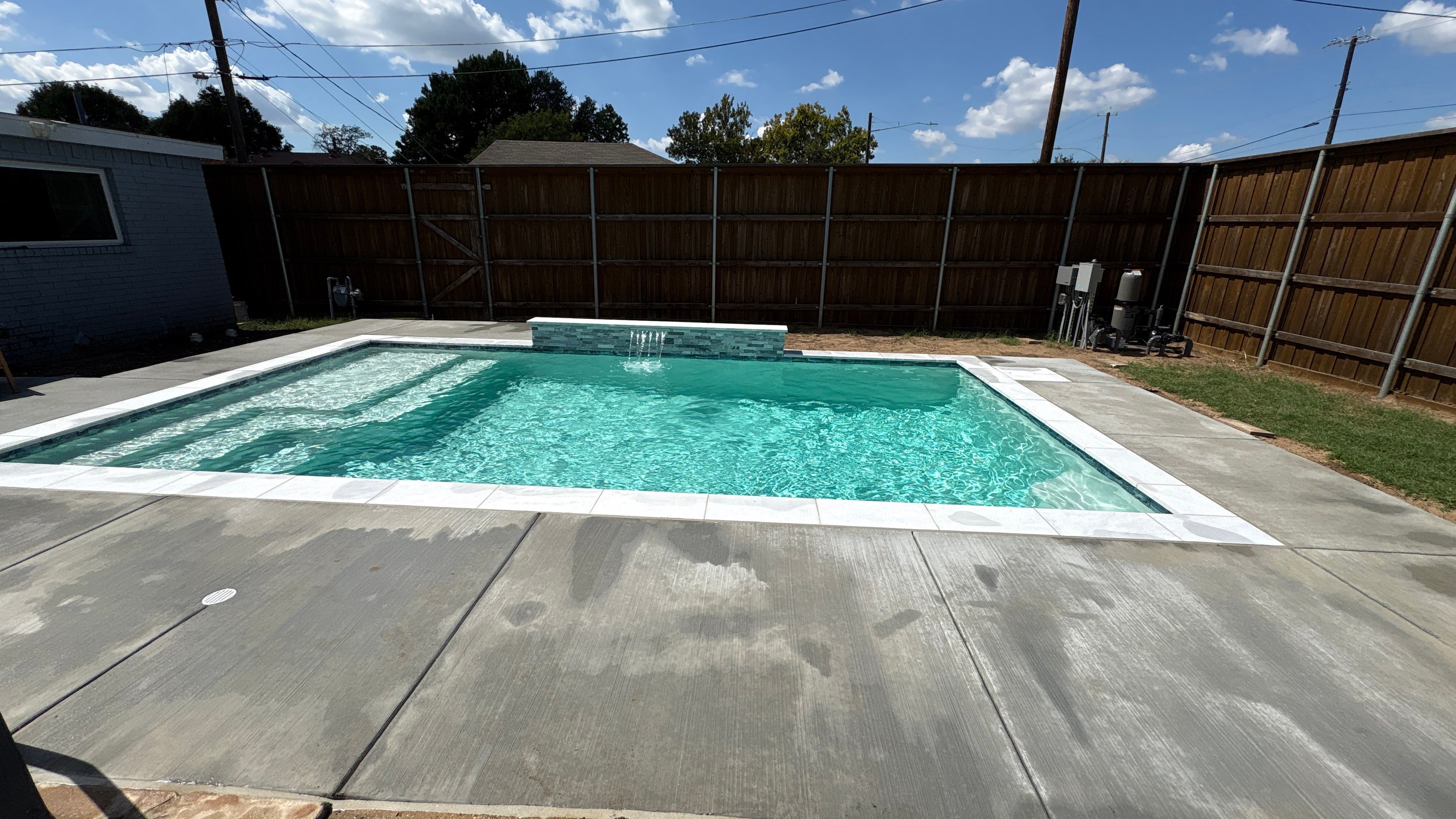Compact Geometric Pool with Crisp White Interior by Pinnacle Pools and Spas - DFW