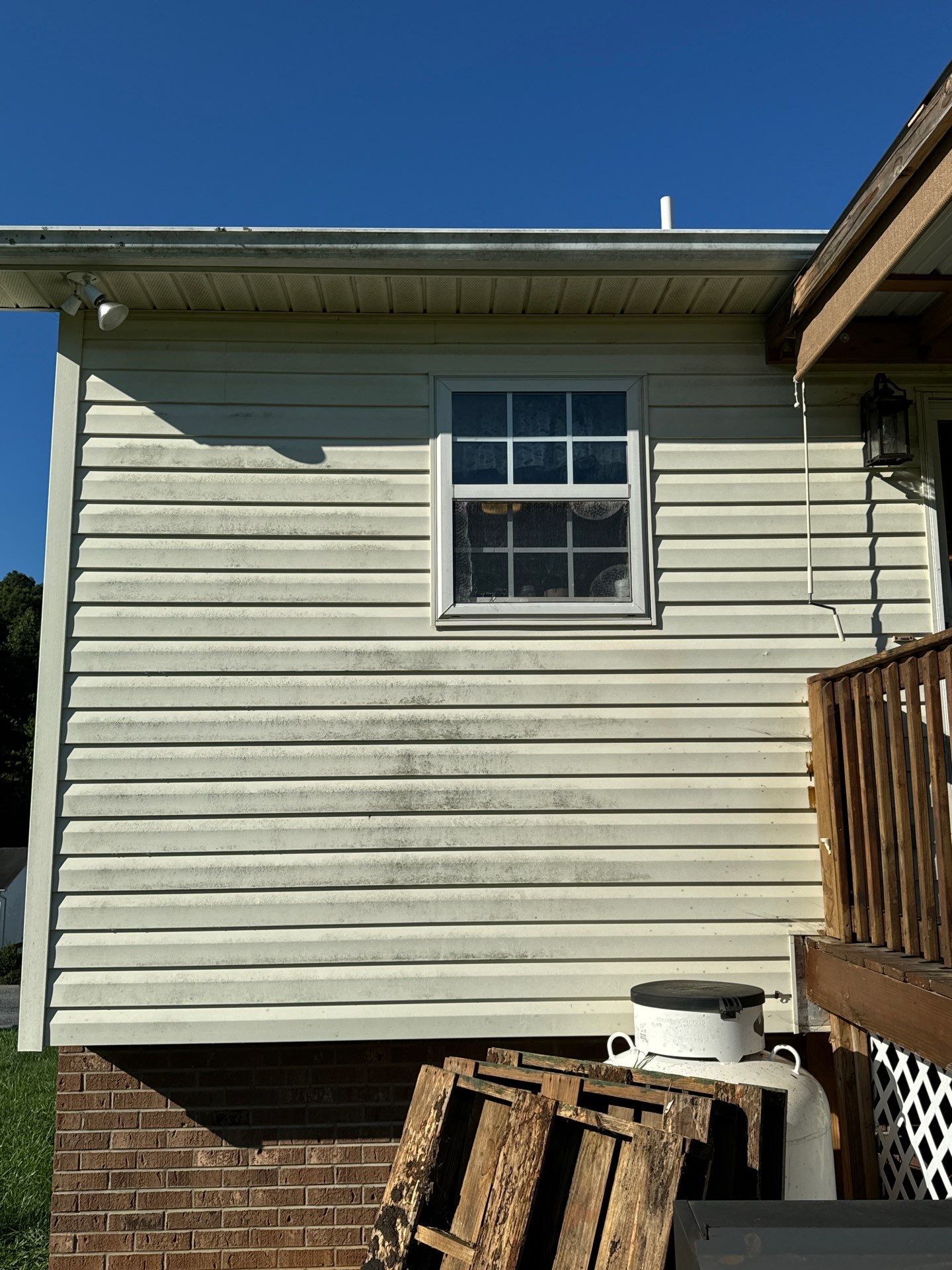 cleaning of exterior vinyl siding to remove dirt and stains for improved appearance and maintenance