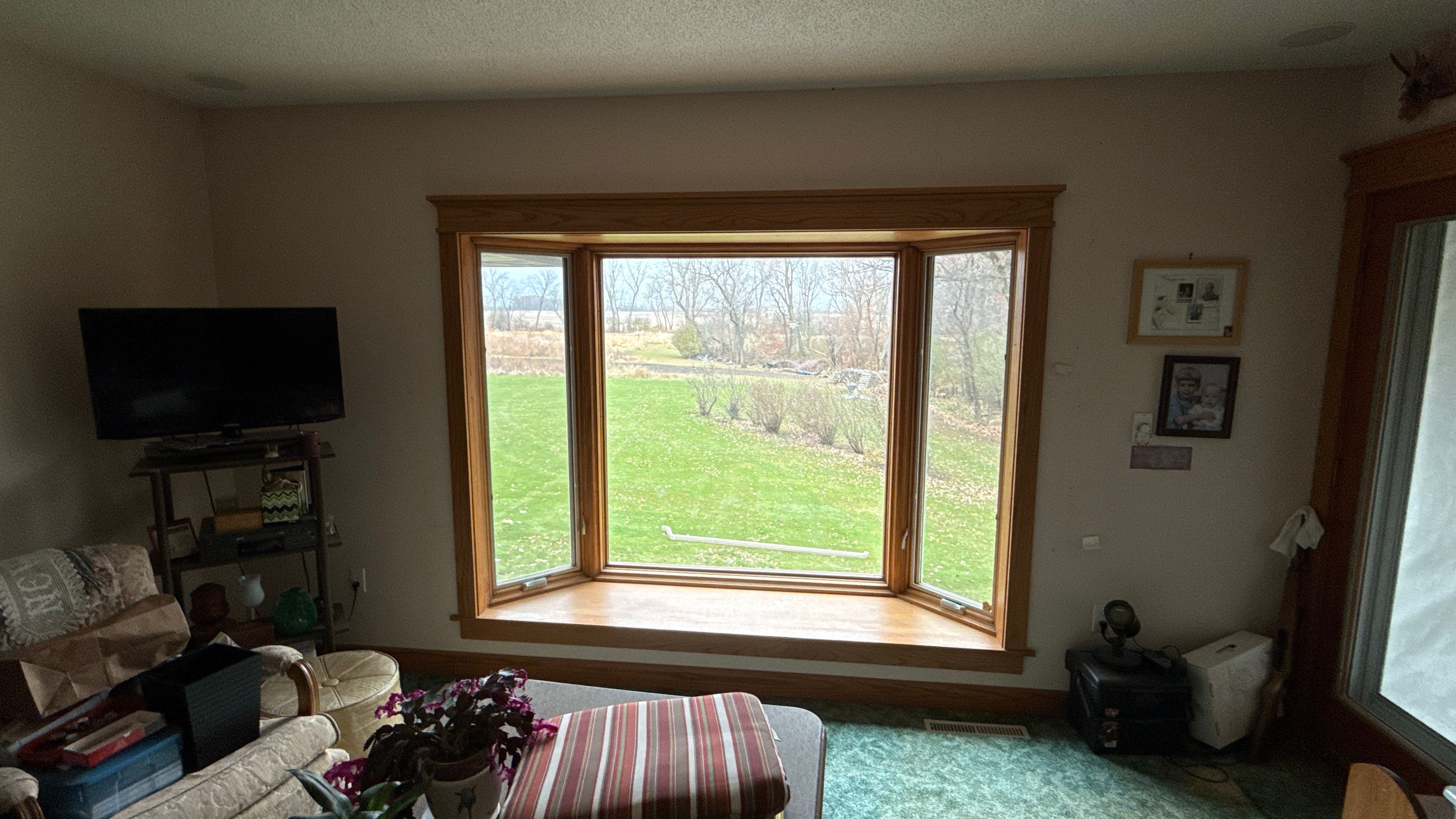 A Clean Window Upgrade Ready for New Siding with Pella Lifestyle Series by United Windows and Siding LLC