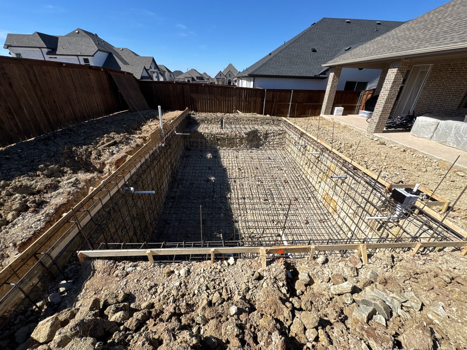 Geometric Pool with Tanning Ledge and Bubbler by Pinnacle Pools and Spas - DFW